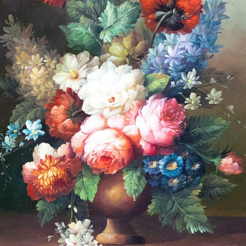 An exquisite still life of peonies & delphiniums. Presented in a handsome gilt-effect frame with a fine linen slip. Signed by the artist to the lower right. On panel.