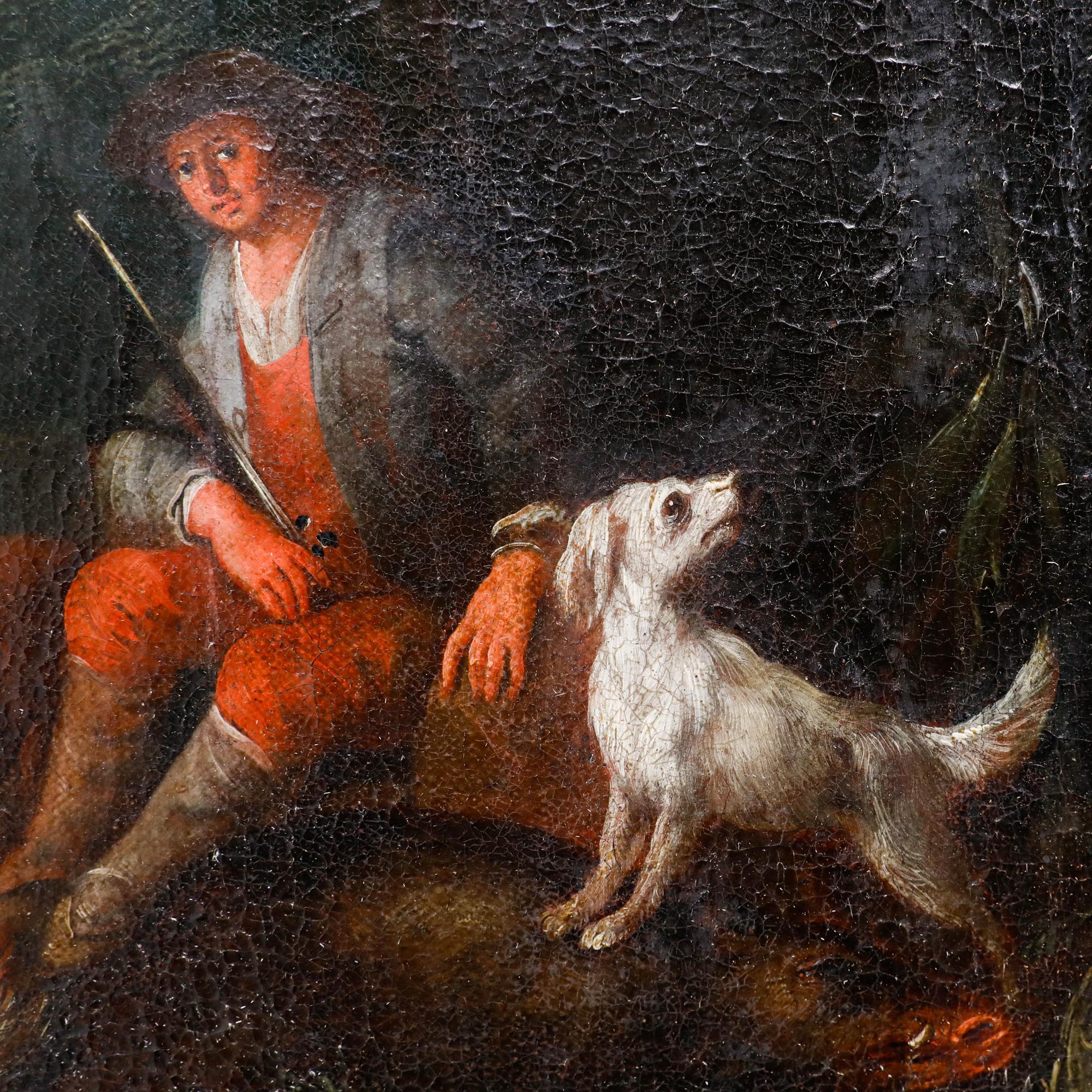 This intimate oil painting depicts a hunter in a red coat resting in a wooded landscape, accompanied by hunting dogs and the day's quarry of game birds scattered at his feet. The composition uses rich, earthy tones and dramatic chiaroscuro lighting