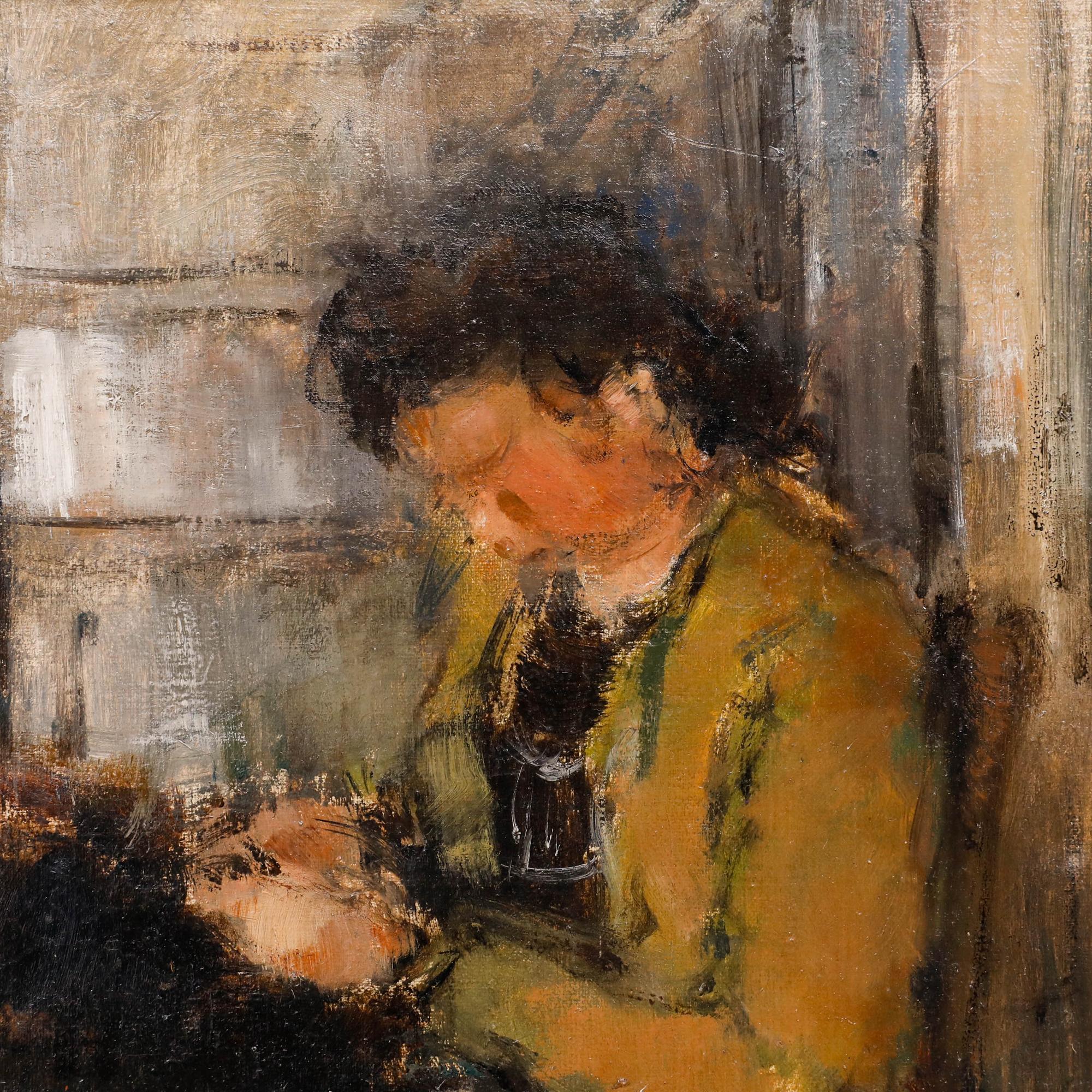 This atmospheric painting captures an intimate interior scene, rendered in soft, muted tones that create a sense of warmth and quiet contemplation. The composition focuses on a central figure engaged in altering a garment at a table.

Signed.