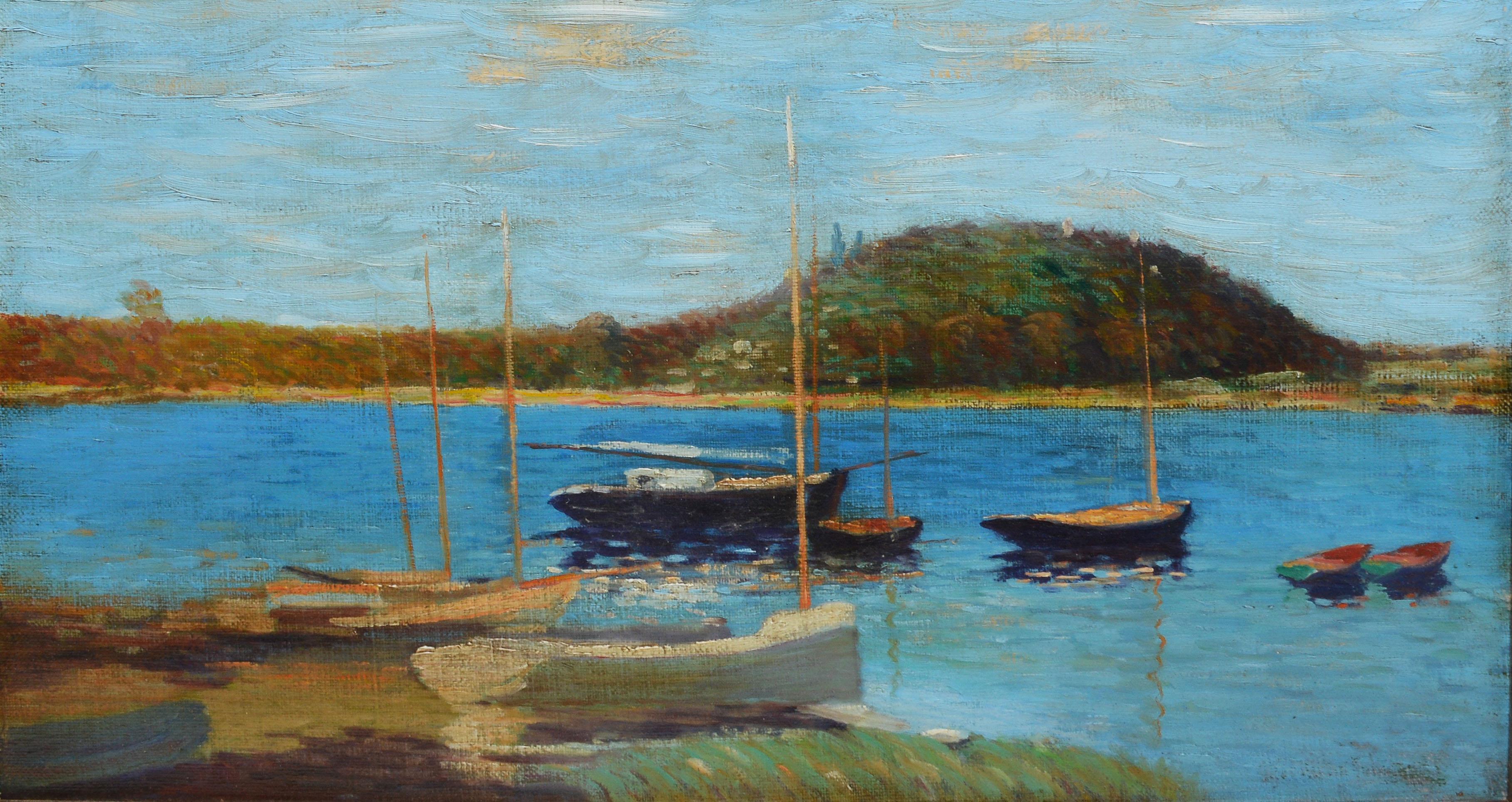 Impressionist view of a lake with boats.  Oil on canvas, circa 1900.  Unsigned.  Displayed in a silver leaf frame.  Image size, 24