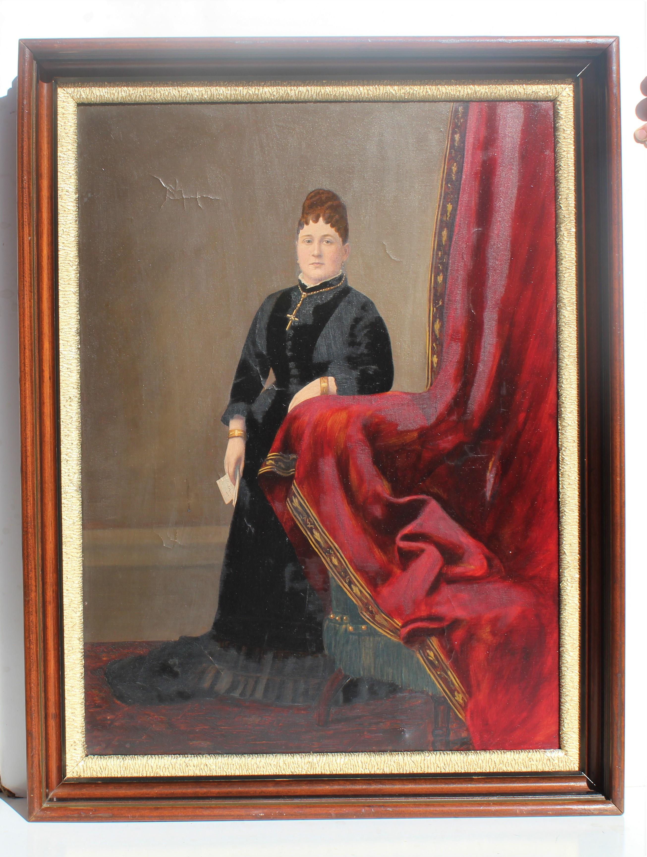 This is an original antique 19th-century large oil painting on canvas painting depicting a portrait of a Lady in a long black dress, standing near a bright red curtain.

The painting overall is in good antique condition, has some craquelures due to