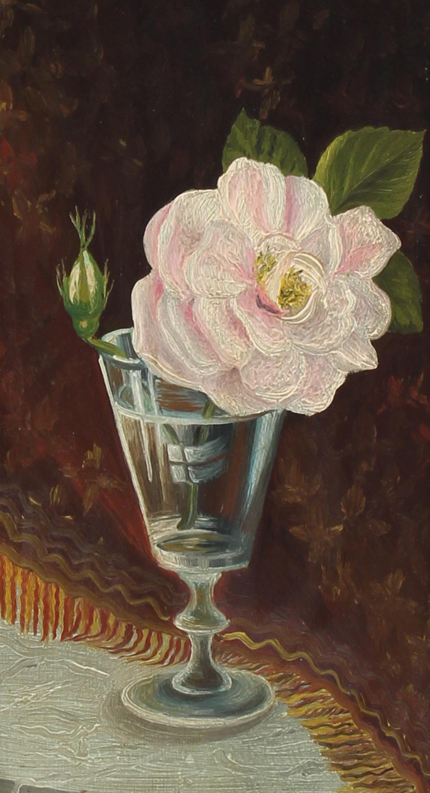 A sweet antique American still life painting on wood depicting a large pink flower in a clear vase.

This charming work comes in a period frame.  