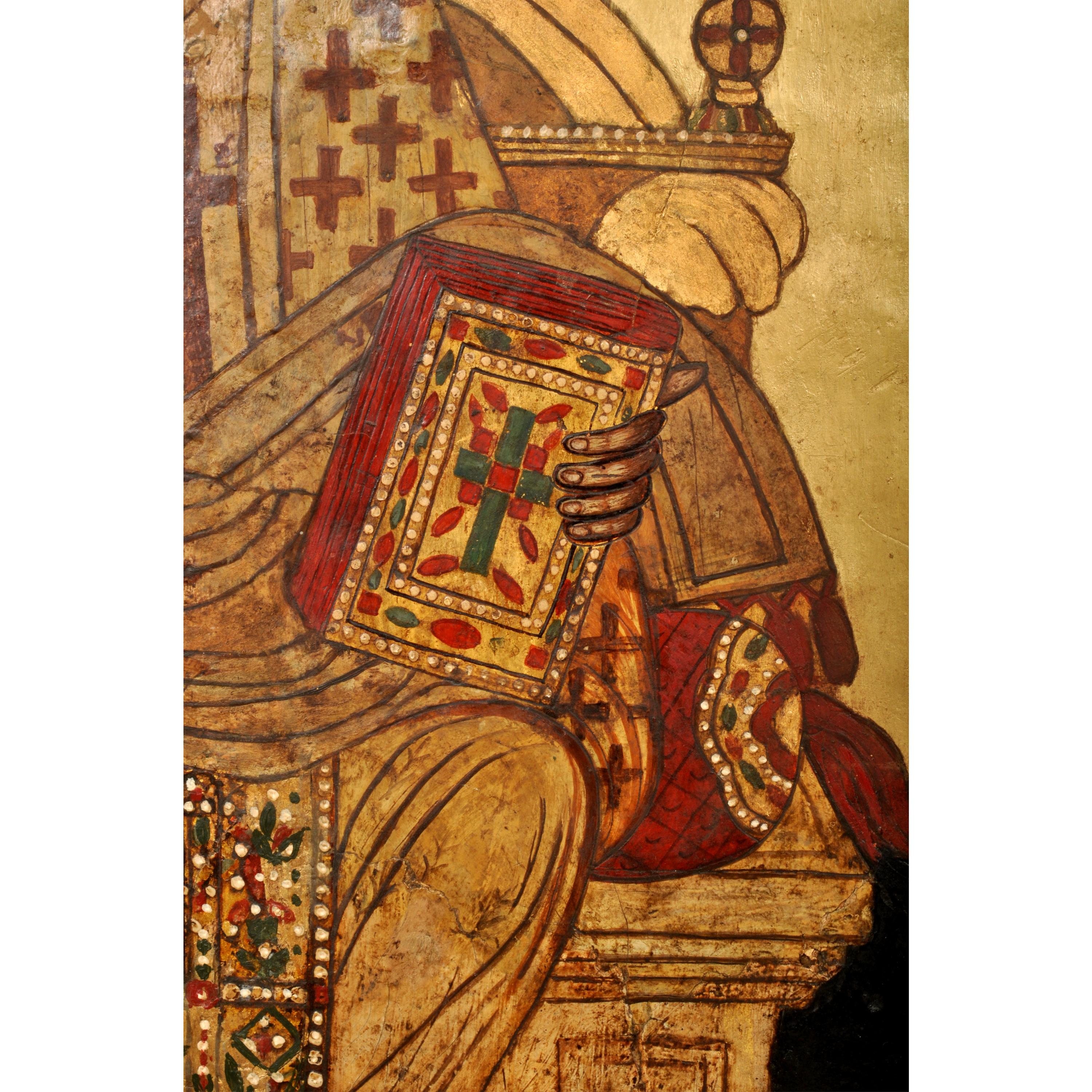 A fine & rare 17th century Greek Orthodox Icon, Saint Athanasios (Athanasius), circa 1650.
The icon depicting Saint Athanasios enthroned in  the Byzantine style and painted with egg tempera and heightened with 24 karat gold leaf. This icon was