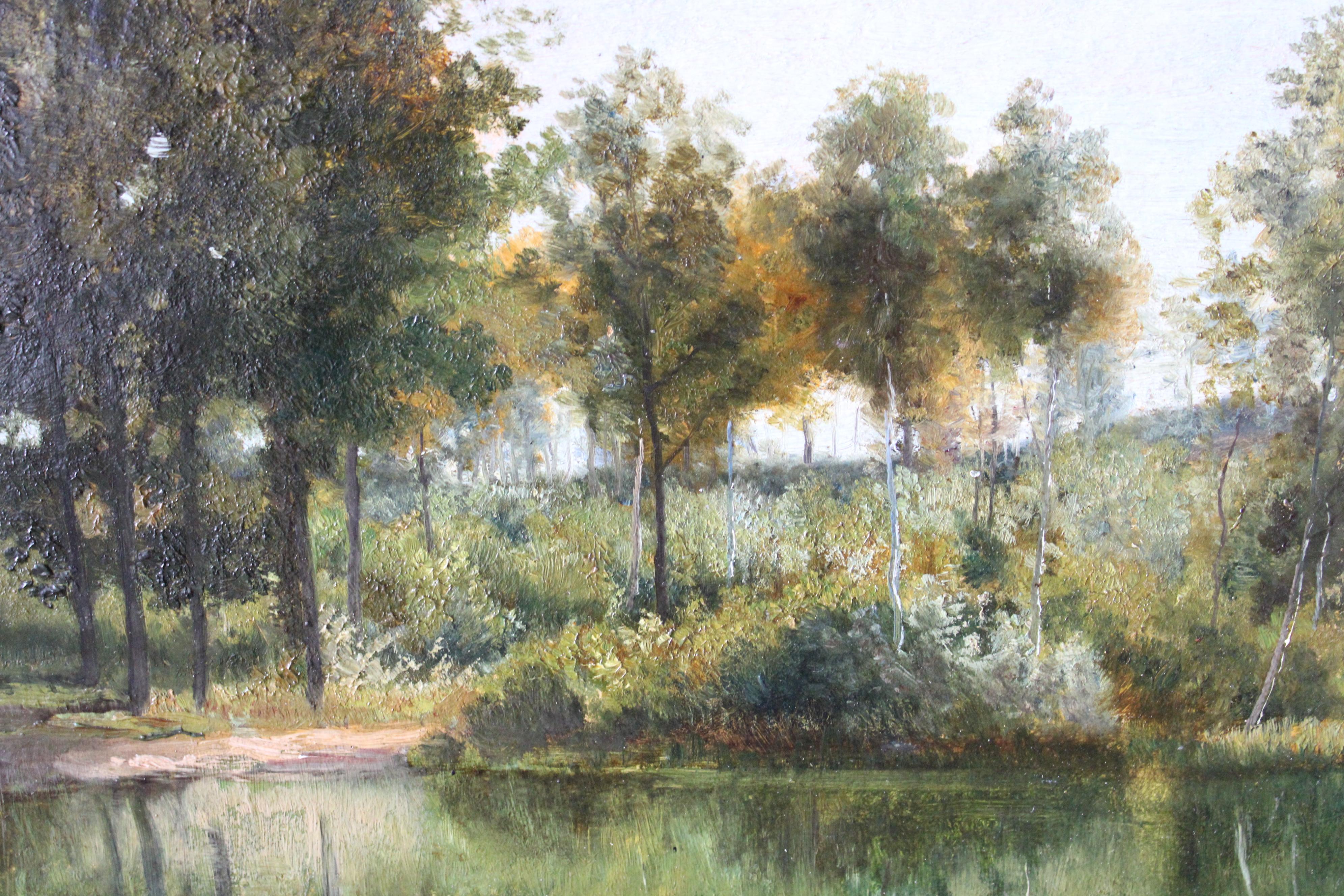 Antique French landscape/riverside oil painting on card in a gilt frame, unsigned.  This is a charming and somewhat typical French landscape/riverscape with plenty of atmosphere brought on by colourful hues of greens, browns and blues and a myriad