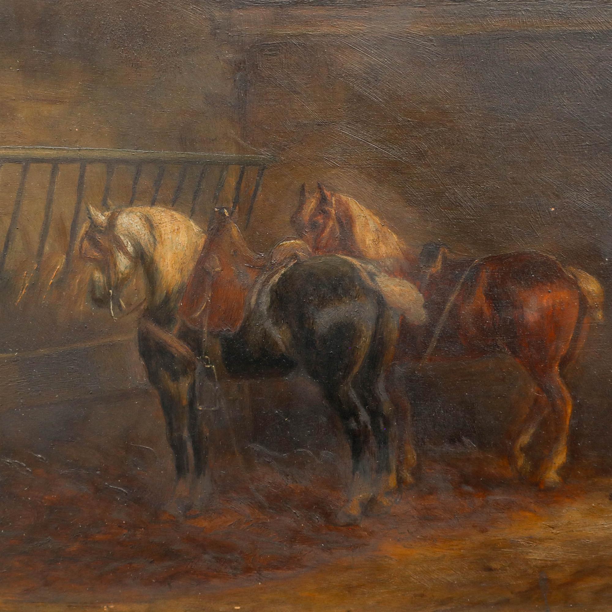 This fine oil painting depicts a rustic stable interior where a figure tends to horses in the warm, golden light filtering through the barn entrance. The artist employs rich earth tones and careful attention to architectural details like wooden