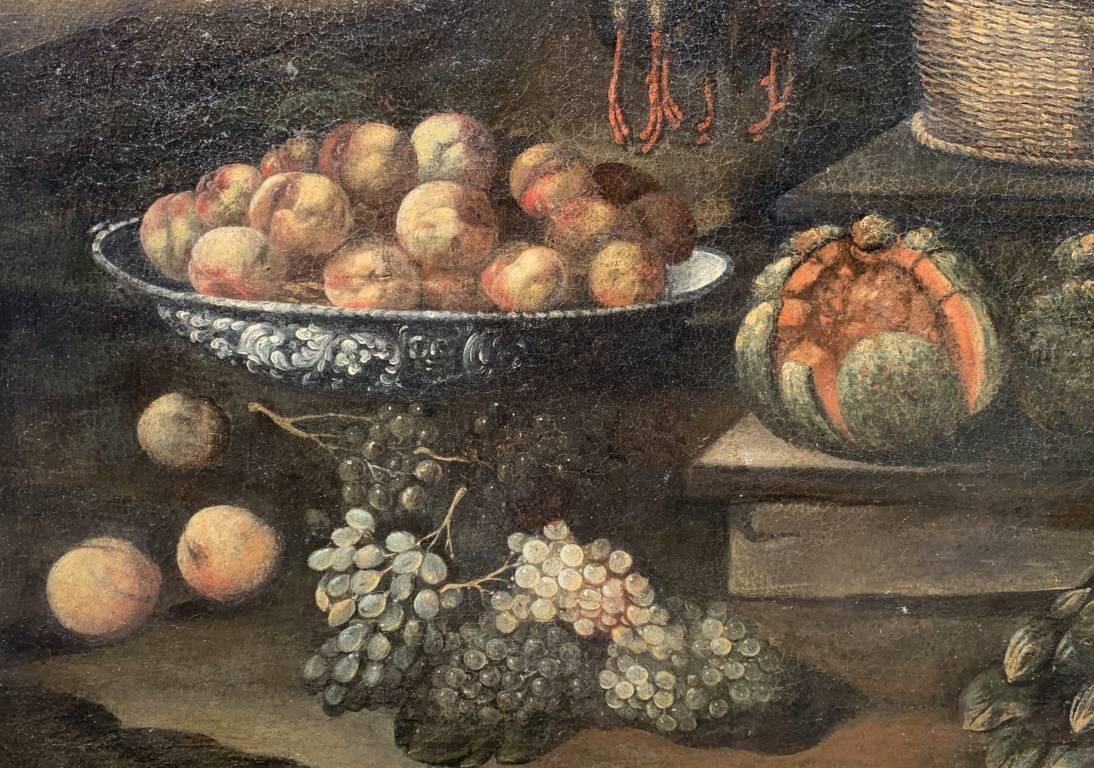 Maestro italiano (principios del siglo XVII) - Bodegón con frutas, verduras y caza.

108 x 133 cm sin marco, 118,5 x 144,5 cm con marco.

Óleo sobre lienzo, en marco de madera dorada.

Informe sobre el estado de conservación: Pintura sometida a
