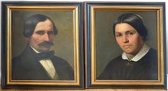 Biedermeier portrait pendants of a couple
