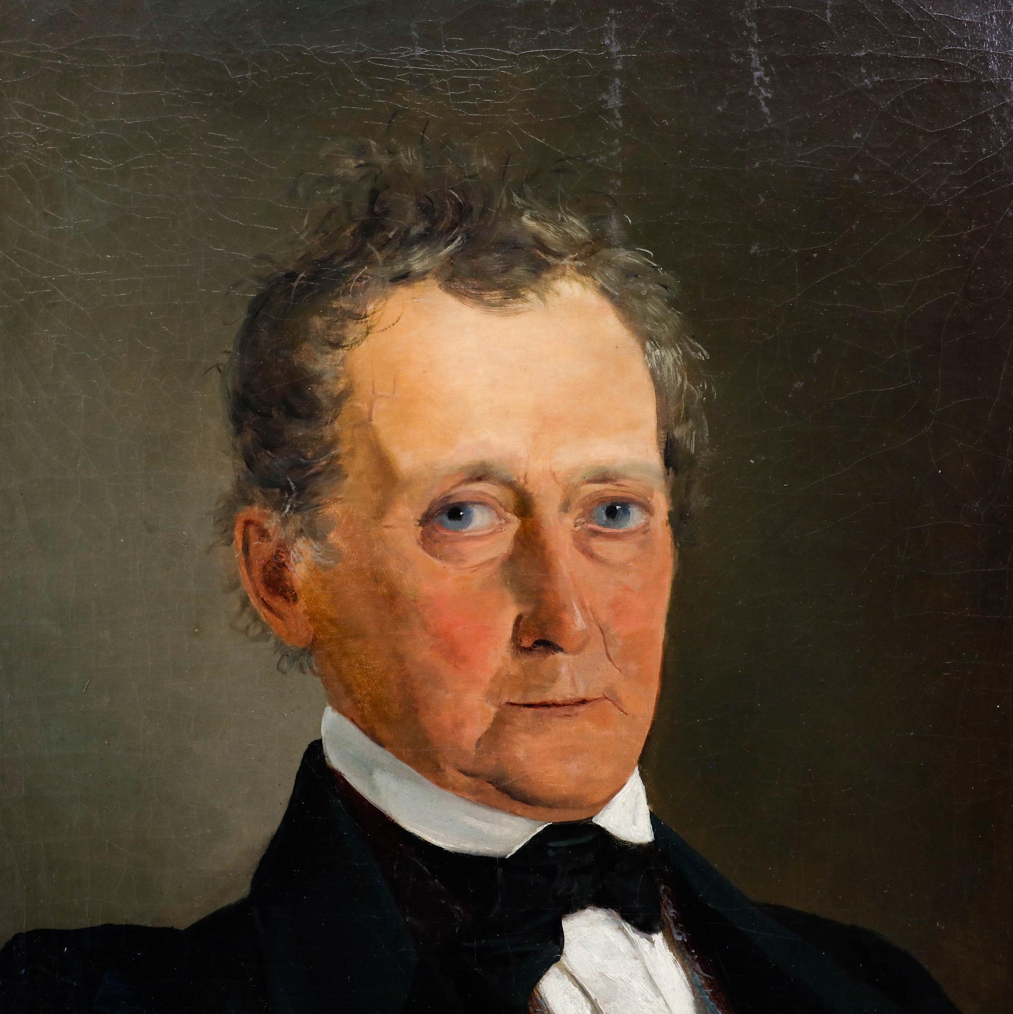 A fine oil portrait depicting a middle-aged gentleman sporting a fine velvet jacket and patterned waistcoat. Acquired as a pair together with a portrait of his wife by the same hand. Unsigned. Presented in a swept gilt frame with ornate foliate and
