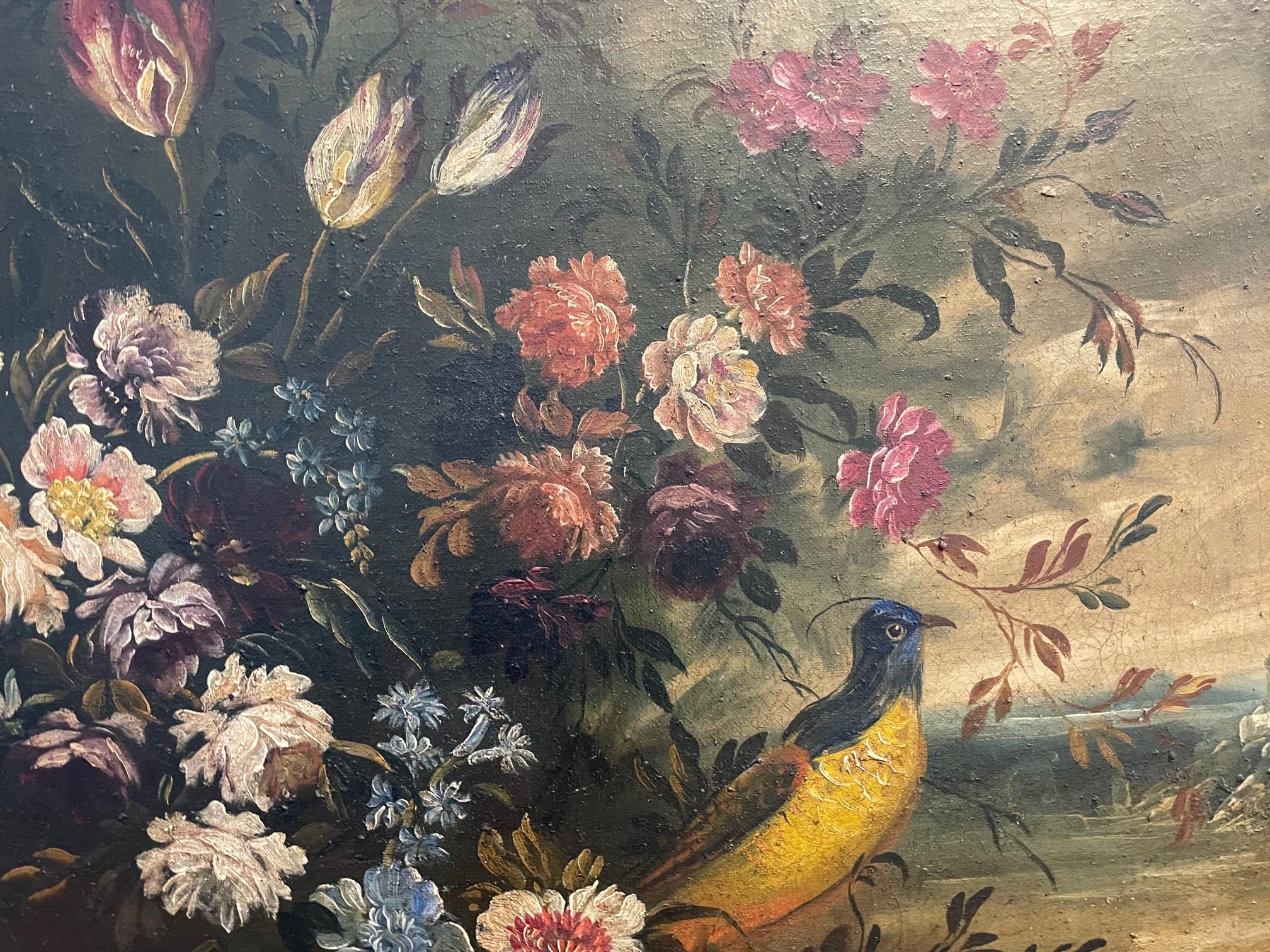 17th century oil pigment painting on canvas likely Italian or Flemish/Dutch Baroque style with water/landscape view to right of blue and golden yellow bird with large floral bouquet.   Paint pigments are textured, giving the painting an overall