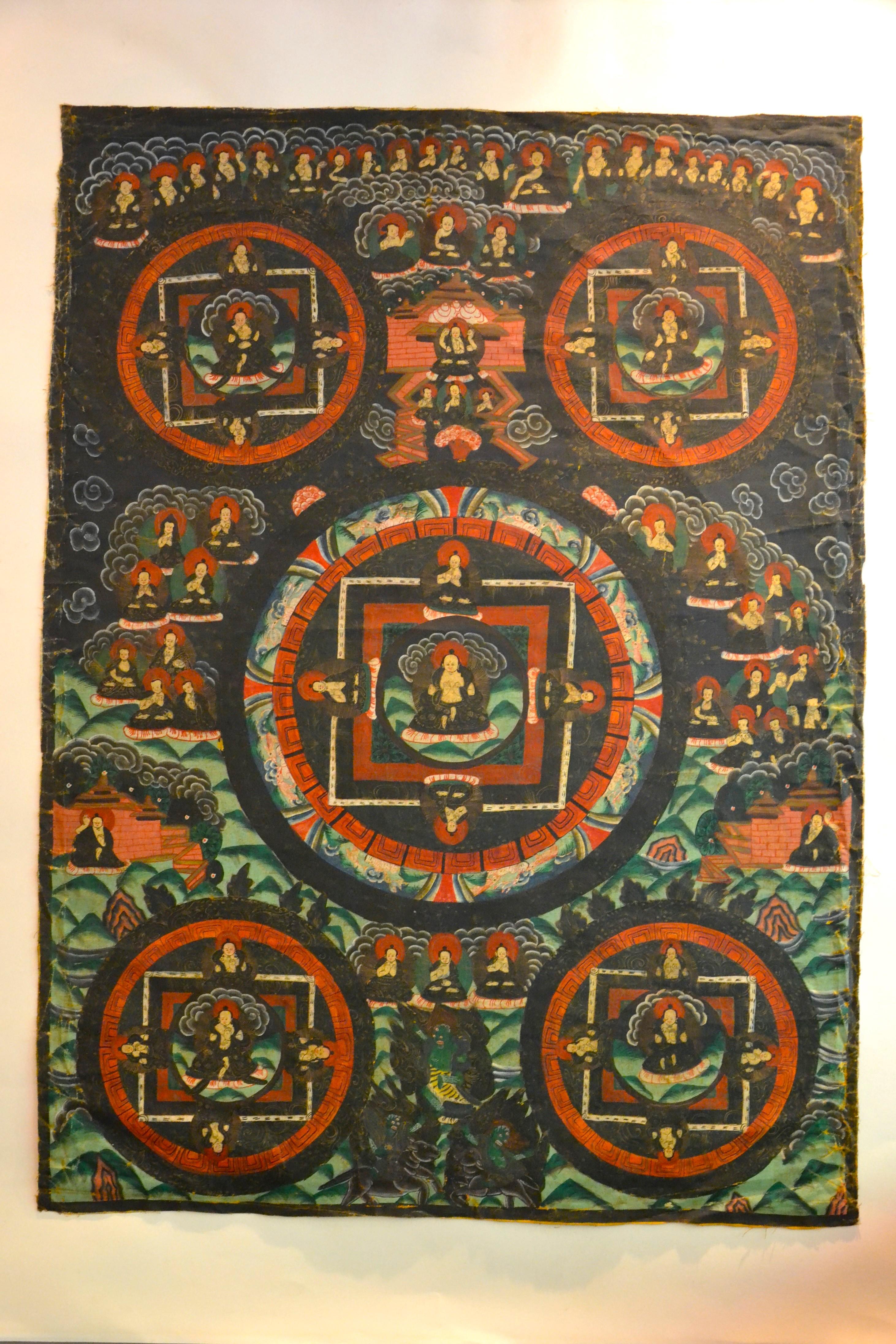 Buddha Mudra Mandala is an original colored artwork realized in Tibet in the early XX century.

Gouache on line mounted on cardboard (110 x 85.5 cm)

This elegant thangka painting illustrates a central representation of Buddha Mudra Mandala framed