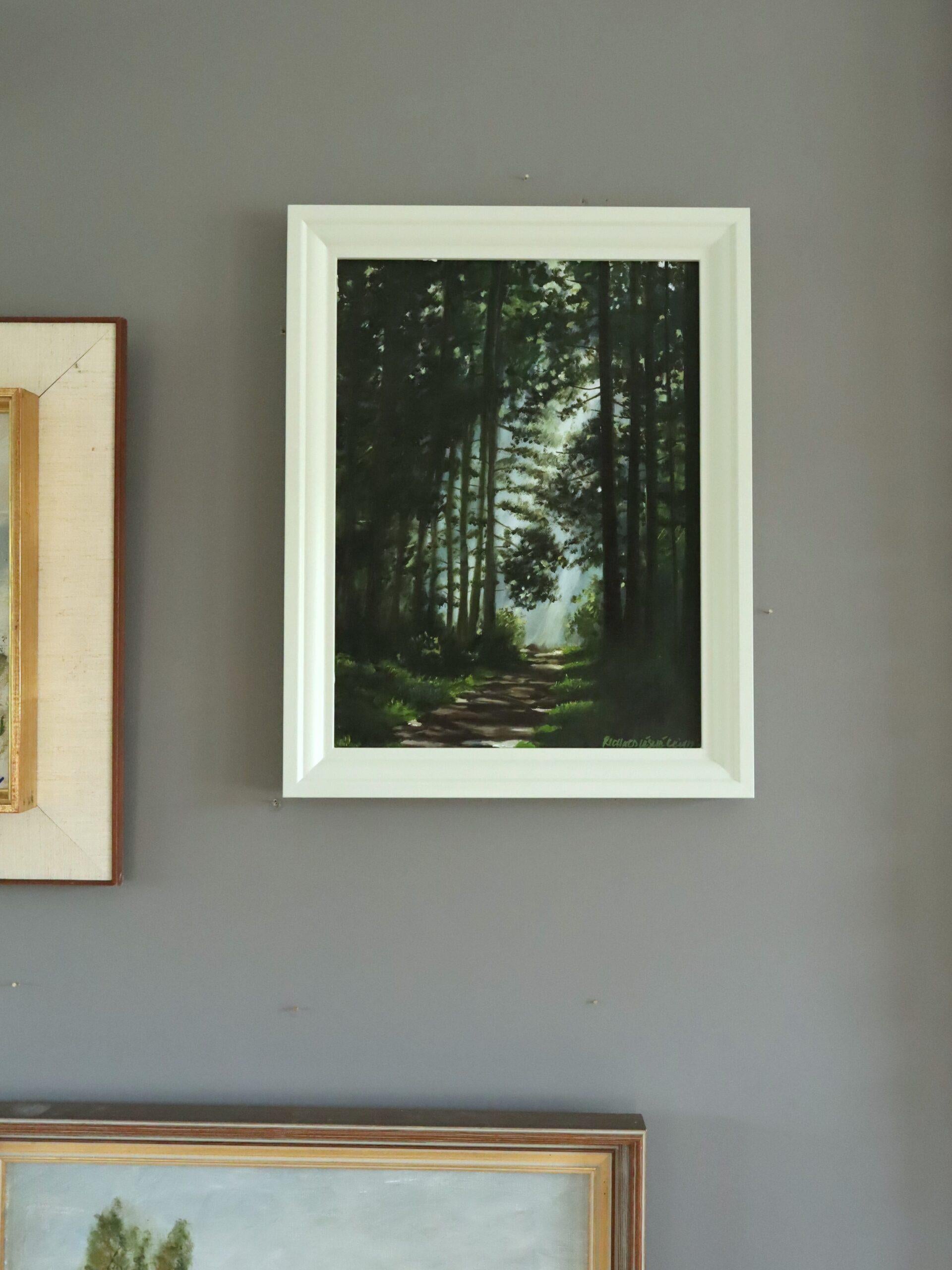 LIGHT AT THE END
Size: 47 x 37 cm (including frame)
Oil on board

A very atmospheric and peaceful woodland scene, executed in oil onto board.

The composition draws the viewer’s eye into the distance, where sunlight breaks through a dense canopy of