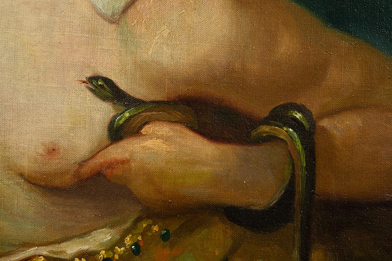 Antique oil-on-canvas painting depicting the most fascinating female protagonist in History, a symbol of beauty and seduction, is depicted here bare-breasted holding a snake ,in a sensual pose charged with pathos.

The Queen of Egypt is depicted