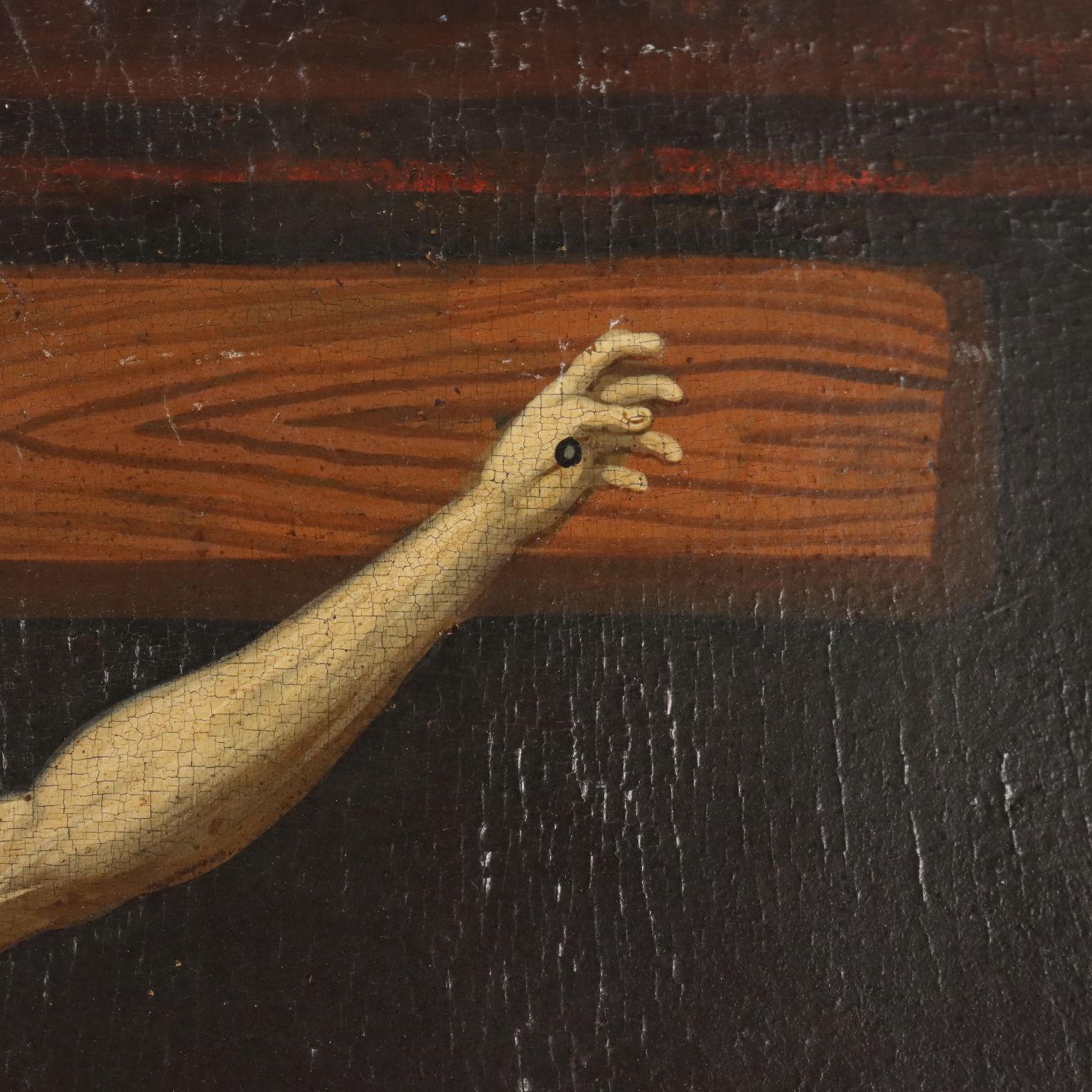 Olio su tavola. Scuola del Nord Italia della fine del XVI secolo.
Su uno sfondo buio si erge verticalmente la Croce, a cui è appeso il corpo del Cristo; ai suoi piedi, abbracciata alla Croce, sta la Maddalena, circondata dal suo manto rosso, colore