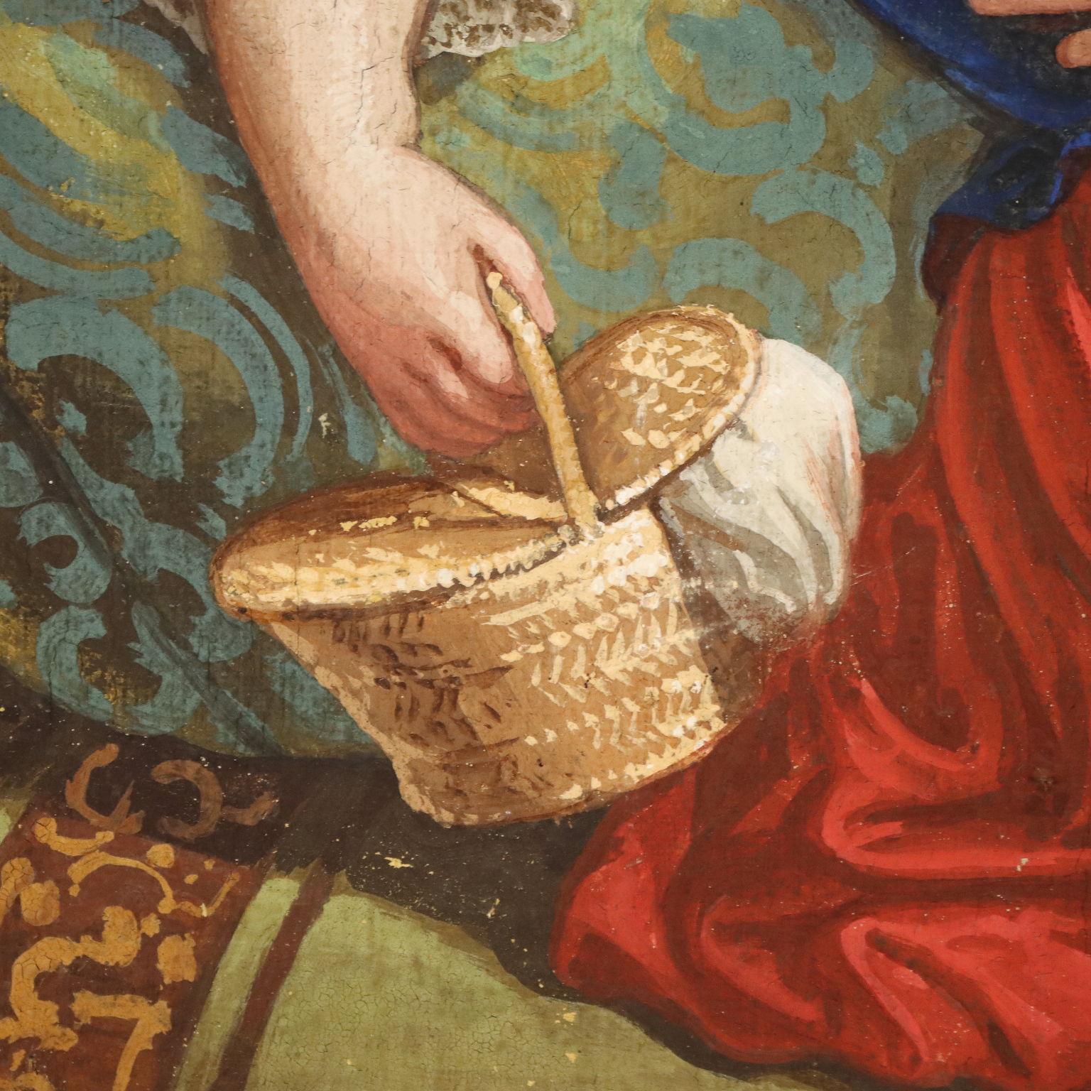Tempera su tela.
Inquadrate in una cornice dipinta, intagliata a volute e dorata, sono ritratte una madre ed una figlia: la giovane donna è languidamente allungata su un divano ottomana, e carezza la bambina inginocchiata accanto a lei, tenendo con