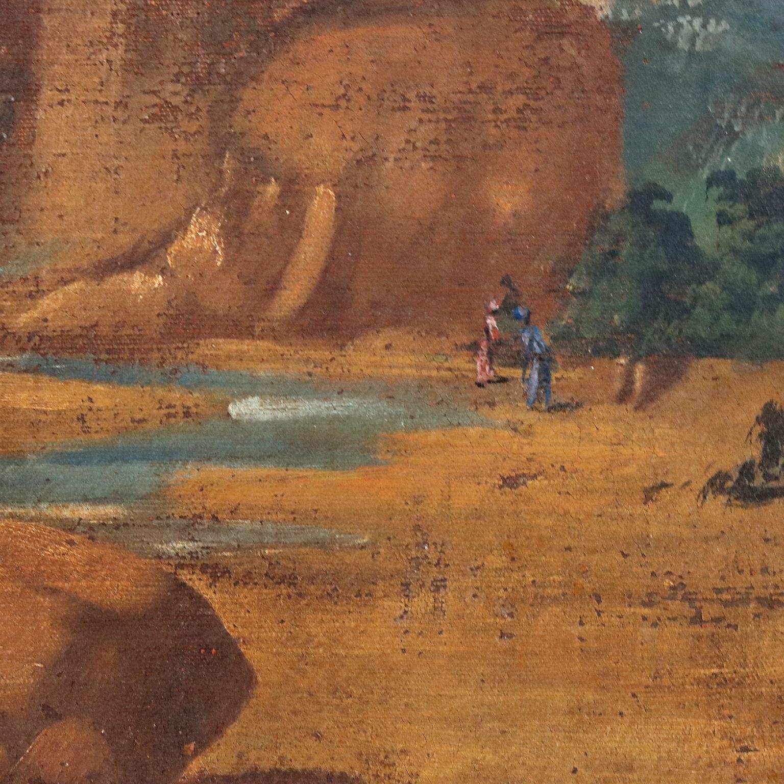 Öl auf Leinwand. 
Das großformatige Gemälde mit achteckigem Umriss zeigt eine Landschaft in einem gemalten Rahmen mit Friesen und gehört zur Kategorie der zu dekorativen Zwecken konzipierten Malerei des 18.
Die Landschaft besteht aus kargen Felsen