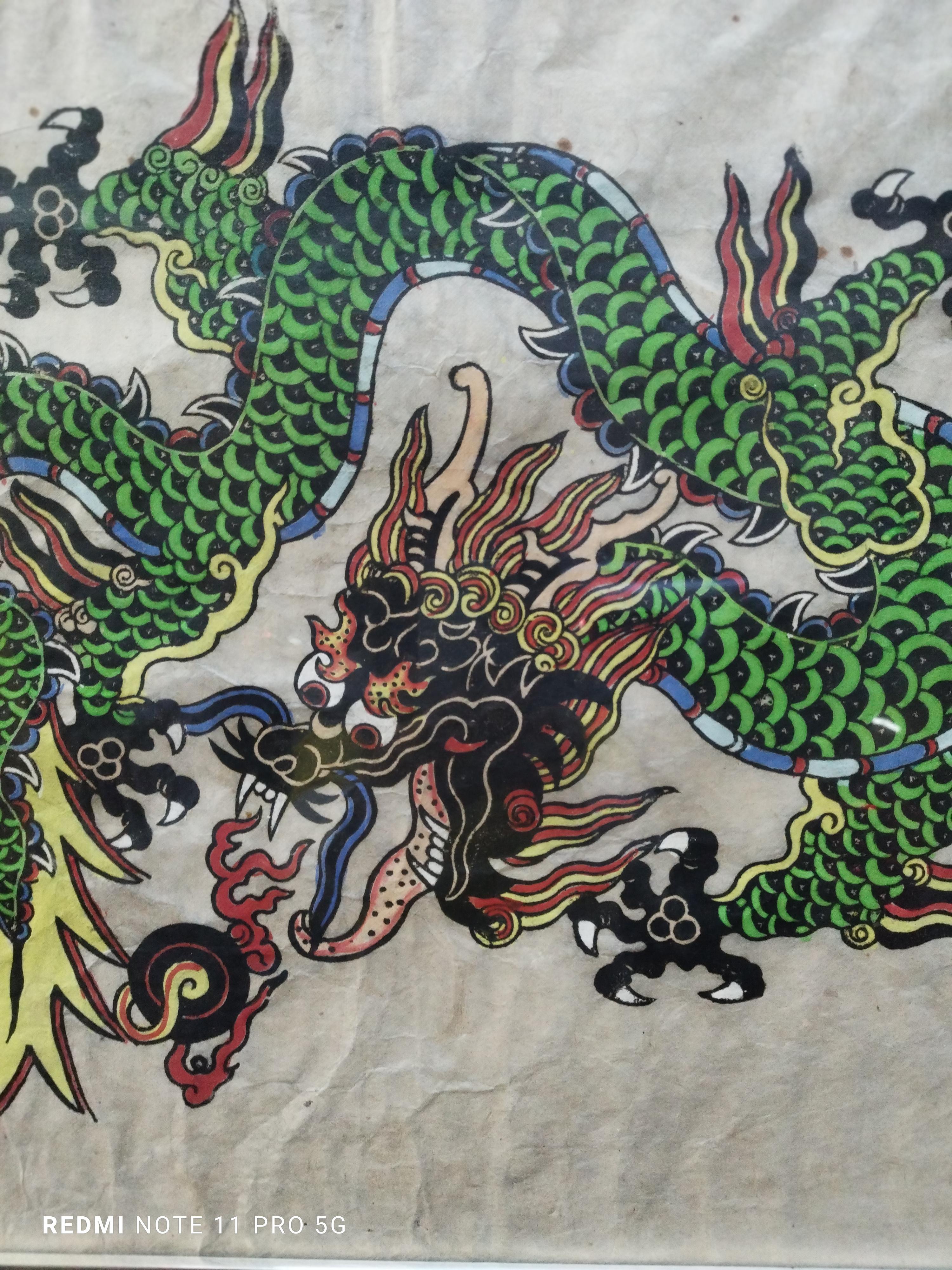 Painted on rice paper depicting a Chinese dragon, with metal frame. He shipped himself without glass
