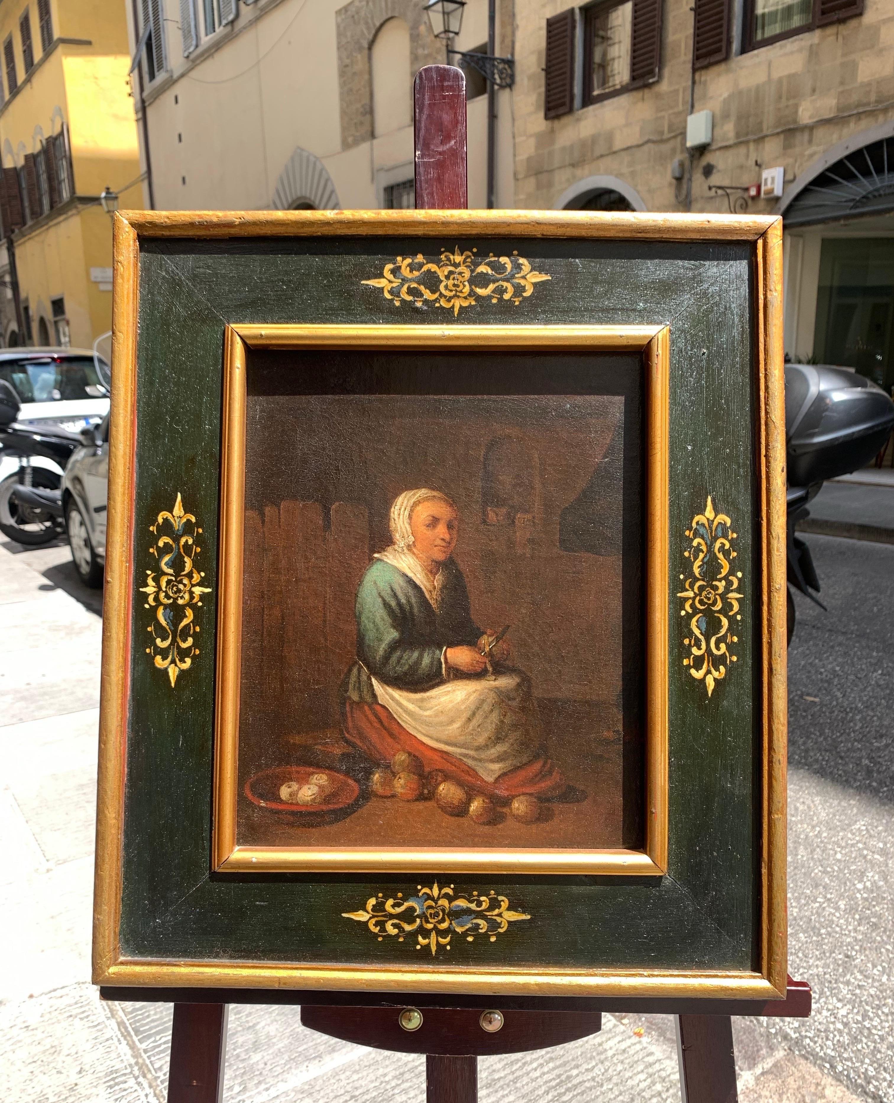 École hollandaise, fin XVIIe - début XVIIIe siècle Scène avec un cuisinier épluchant des pommes - Painting de Unknown