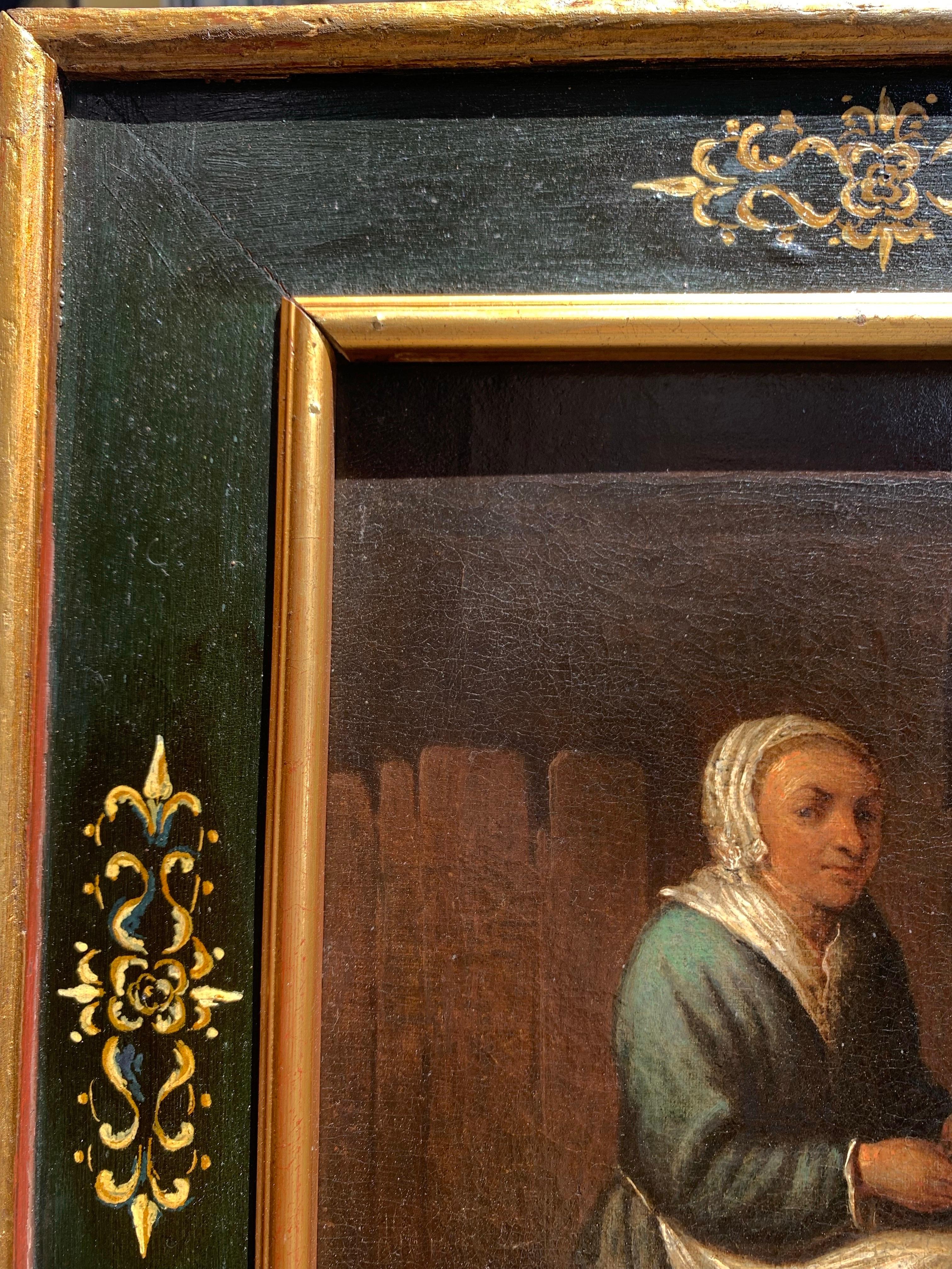 École hollandaise, fin XVIIe - début XVIIIe siècle Scène avec un cuisinier épluchant des pommes - Black Interior Painting par Unknown
