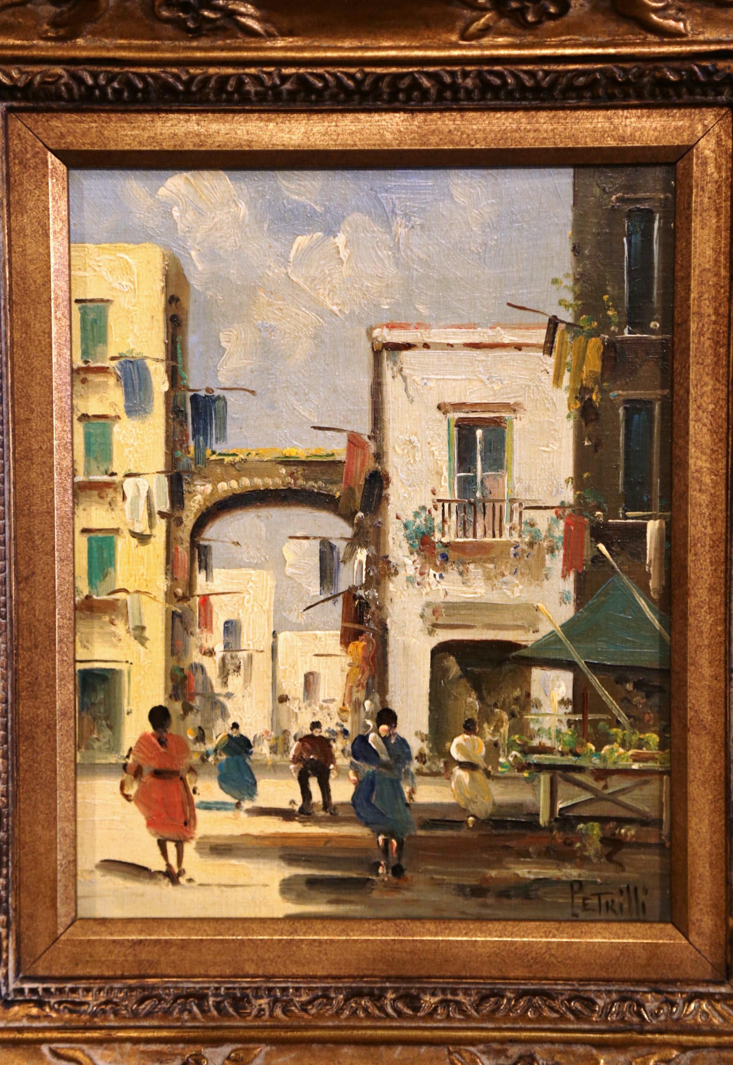 This oil on canvas painting was created in Italy, circa 1920. This painting depicts a European city street scene bustling with people walking down the street. Buildings and anonymous figures diminish in size and disappear into the distant space