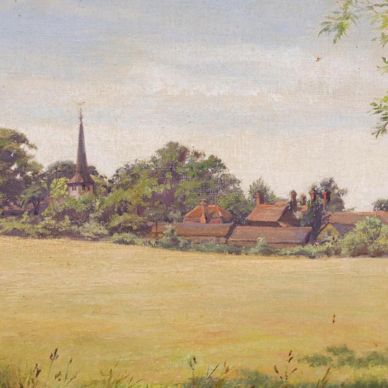 Charmante scène de paysage représentant la lointaine Church's de Brentwood, dans l'Essex. Au premier plan, le soleil d'été darde ses rayons sur des terres agricoles rurales. Signé en bas à droite. Présenté sur un cadre en bois. Sur toile. Taille de