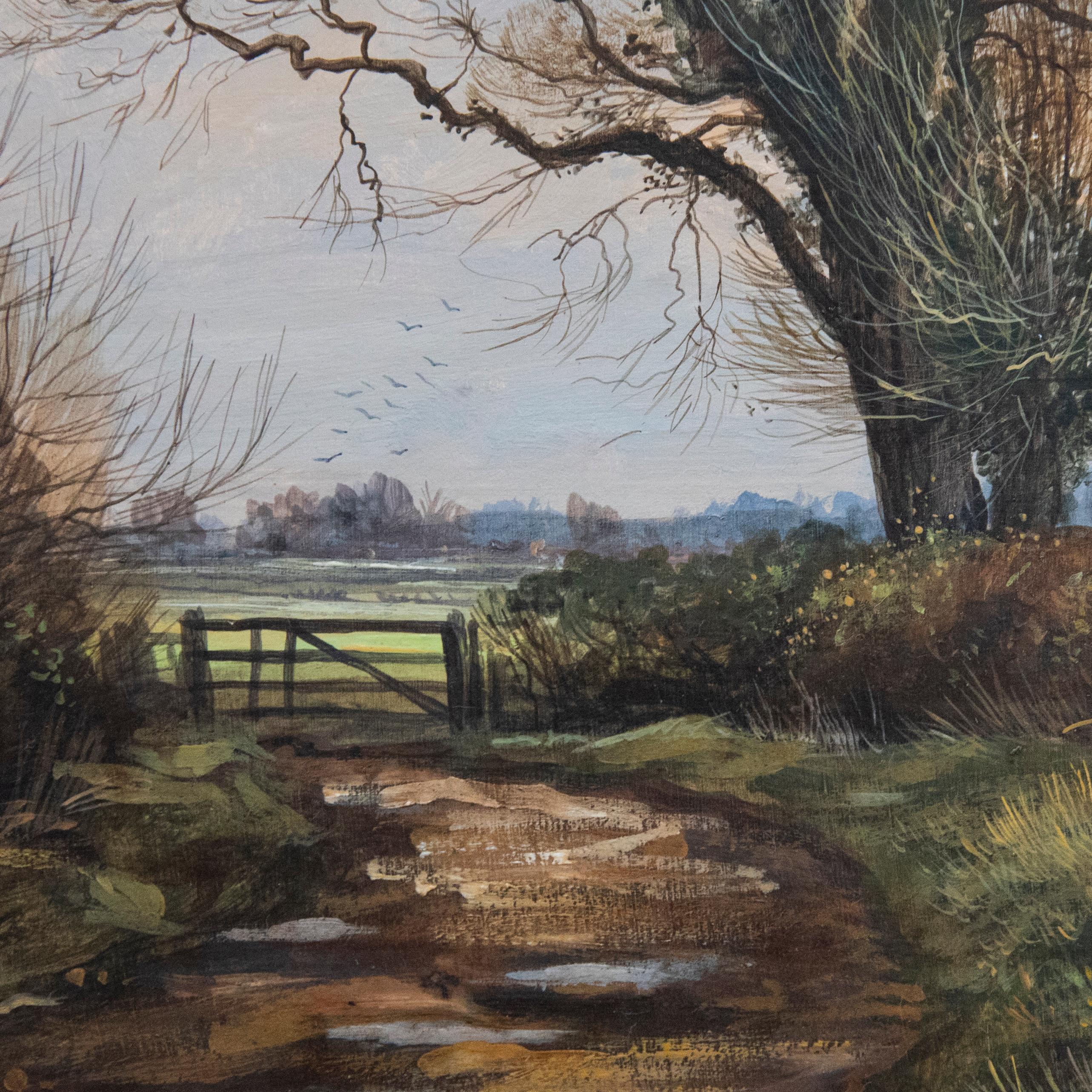 Una meravigliosa scena rurale in acrilico realizzata da Edward Stamp, che ritrae un viottolo invernale vicino a Winslow, nel Buckinghamshire. Ben presentato in un'affascinante cornice del XX secolo con effetto dorato. Firmato e datato (1983) in