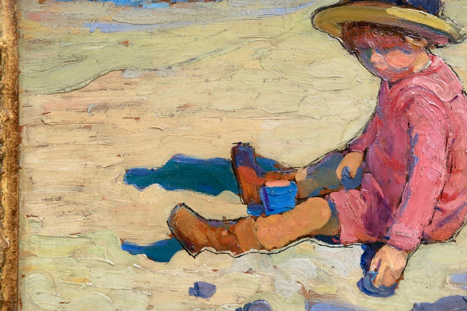 A simply beautiful French Impressionist School oil on panel of a young girl in a boater hat sitting on a sandy beach playing with pebbles with a view of vibrant blue sea in the distance. This work is signed with the signature of Berthe Morisot lower
