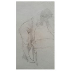 Esquisse de portrait au graphite d'une femme nue, penchée
