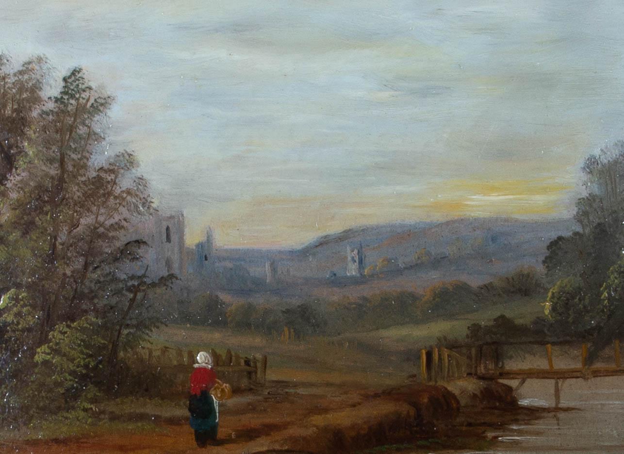 A picturesque rural scene showing a woman returning home with a basket on her arm. The sun is sinking behind the distant hills as she approaches a rural village with its church spires visible in the distance. The painting is unsigned and presented