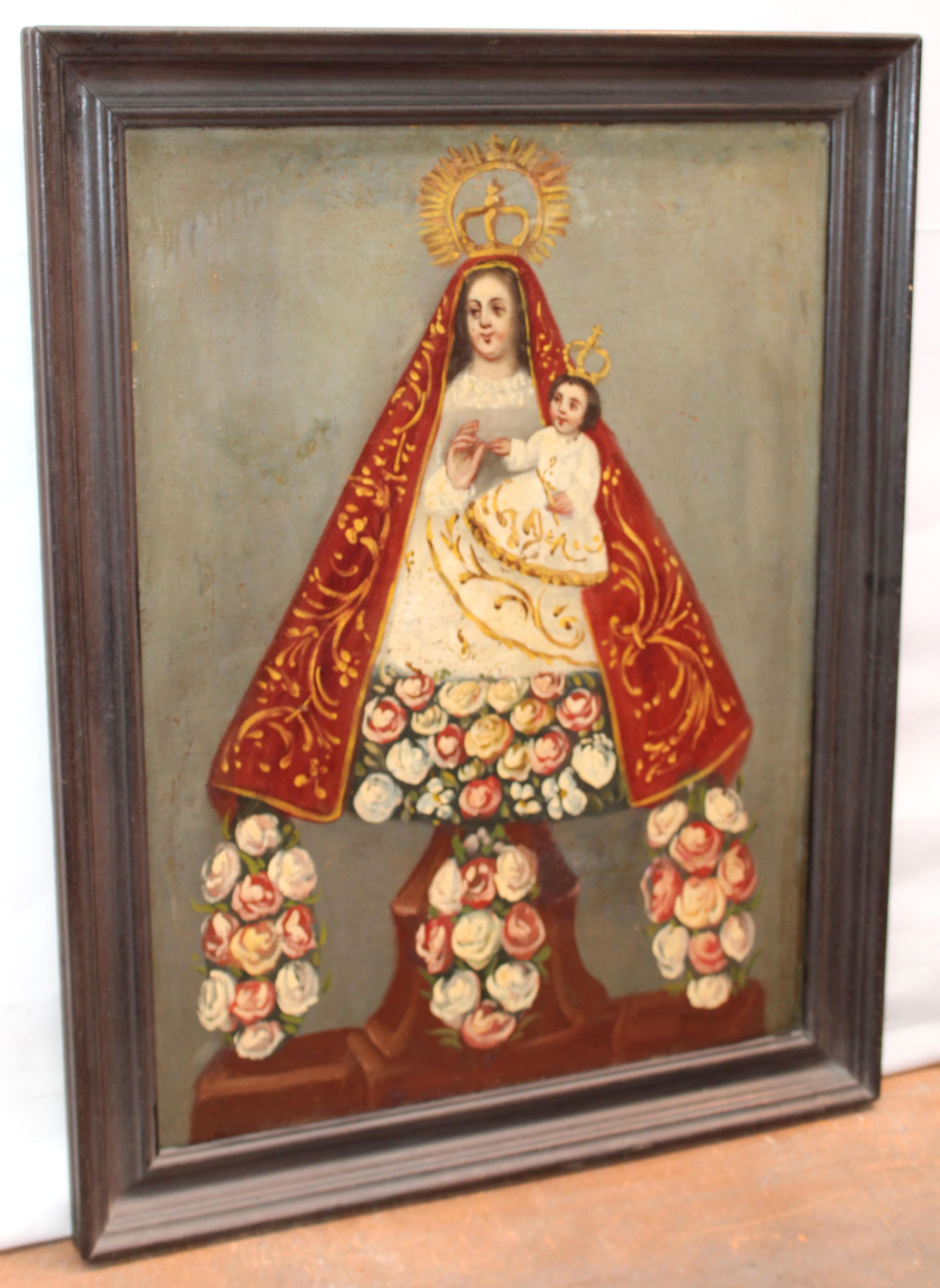 Excuela española (XVIII) -  Virgen con niño - Óleo sobre tela - Painting di Unknown