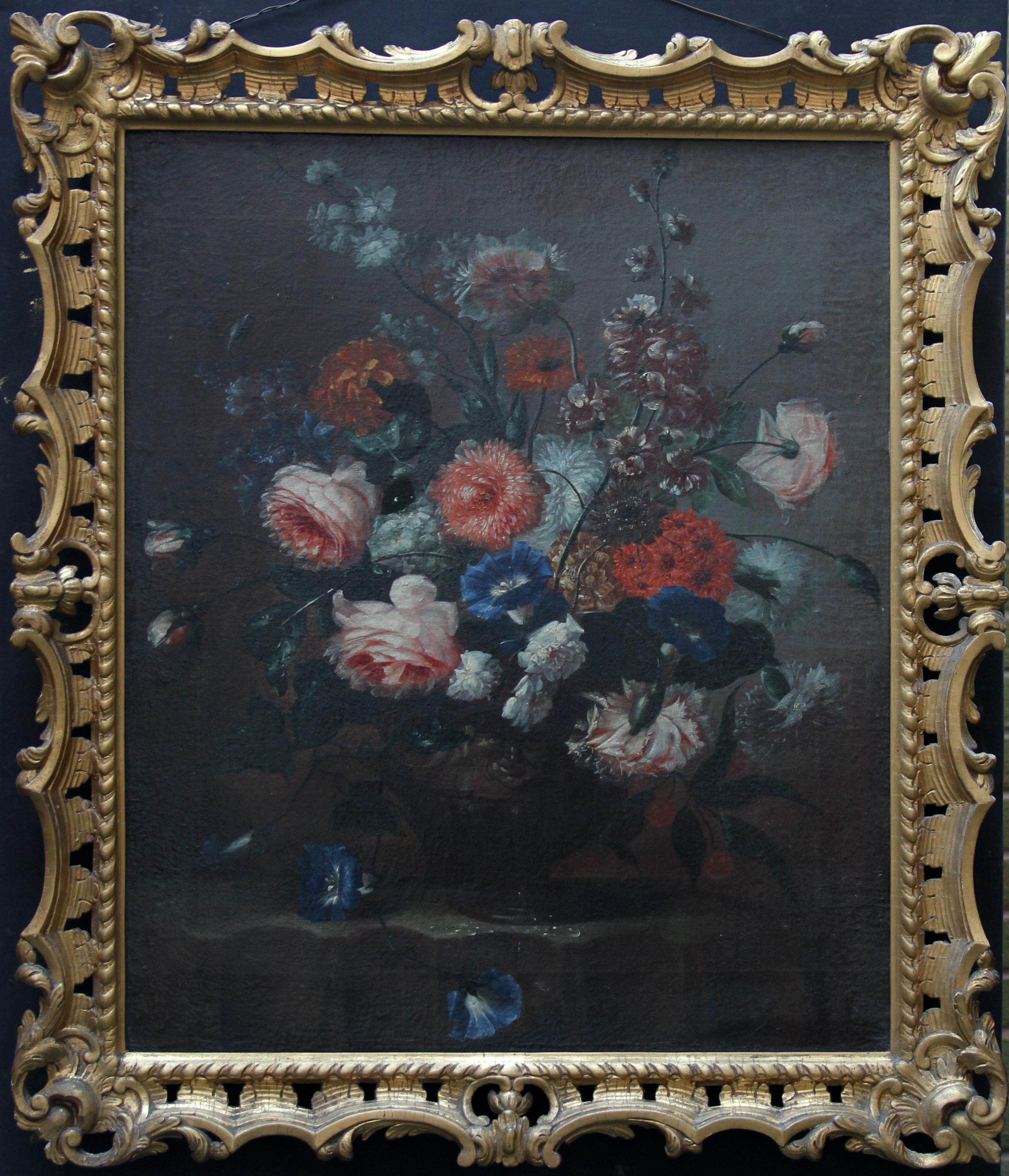 A fine Dutch Old Master floral still life. Painted circa 1700, this oil on canvas depicts peonies roses, convolvulus and other flowers in a bronze vase. A superb 17/18th century Old Master in a fine 18th century carved gilt rococo frame. It is