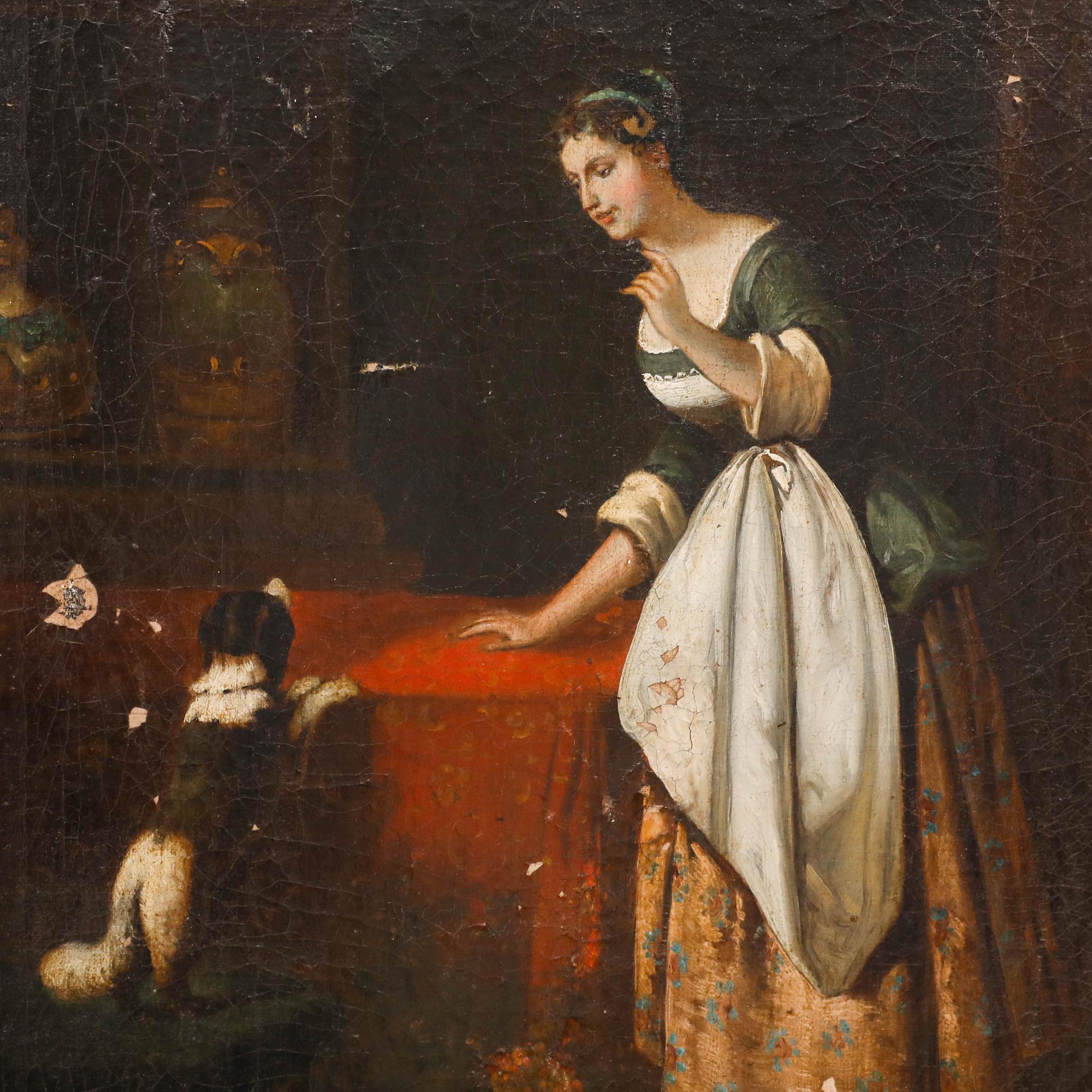 A delightfully endearing 19th century oil depicting a lady in a delicate green and gold dress and her naughty dog, who can be seen leaping onto the furniture. The artist expertly captures a sense of warmth in this charming scene, elegantly