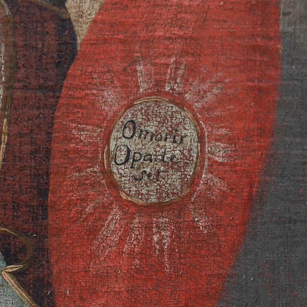 Charmante représentation de Sainte Catherine d'Alexandrie de l'école de Cuzco du XVIIIe siècle. Elle est représentée tenant une plume d'oie, symbole de sa défense érudite du christianisme, et vêtue de riches vêtements rouges, représentant à la fois