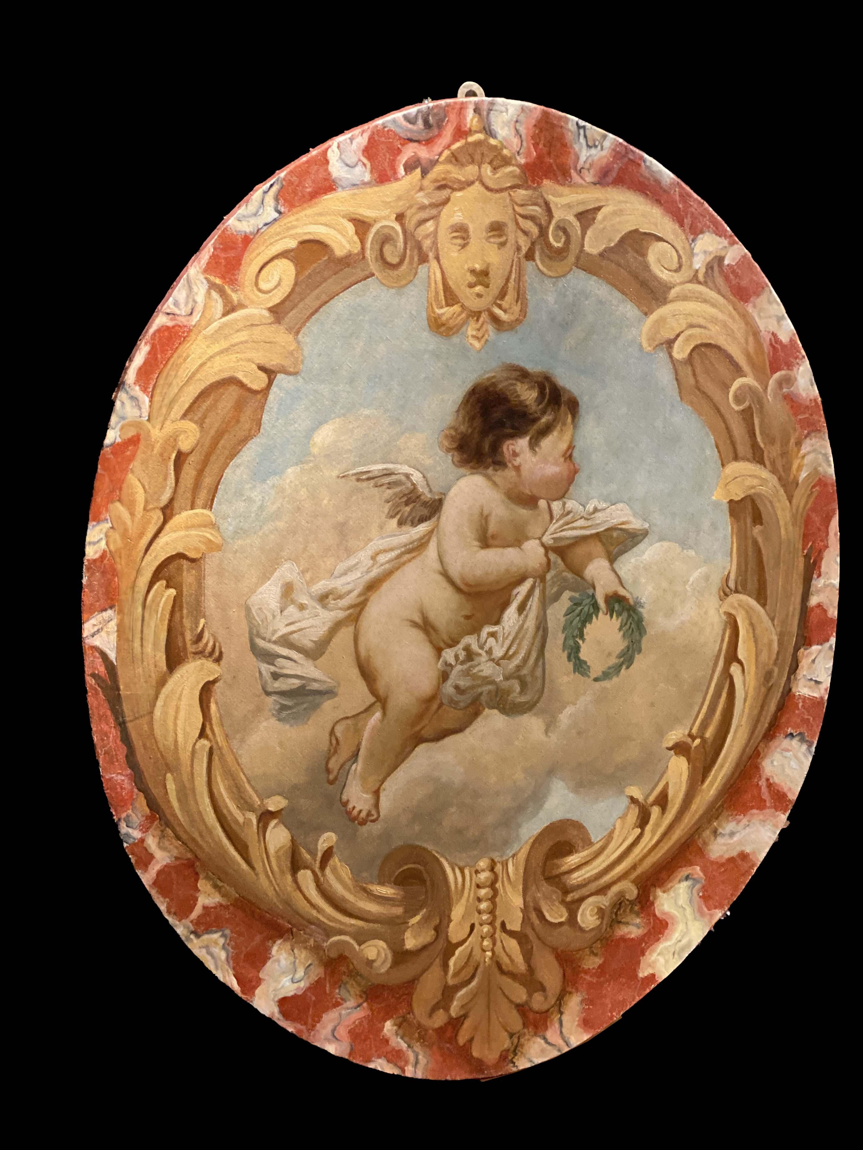 Set di quattro deliziose figure di putto, olio su tela di forma ovale.
Pregevole cornice dipinta a tromple oeil.
 Condizioni originali molto buone. 

