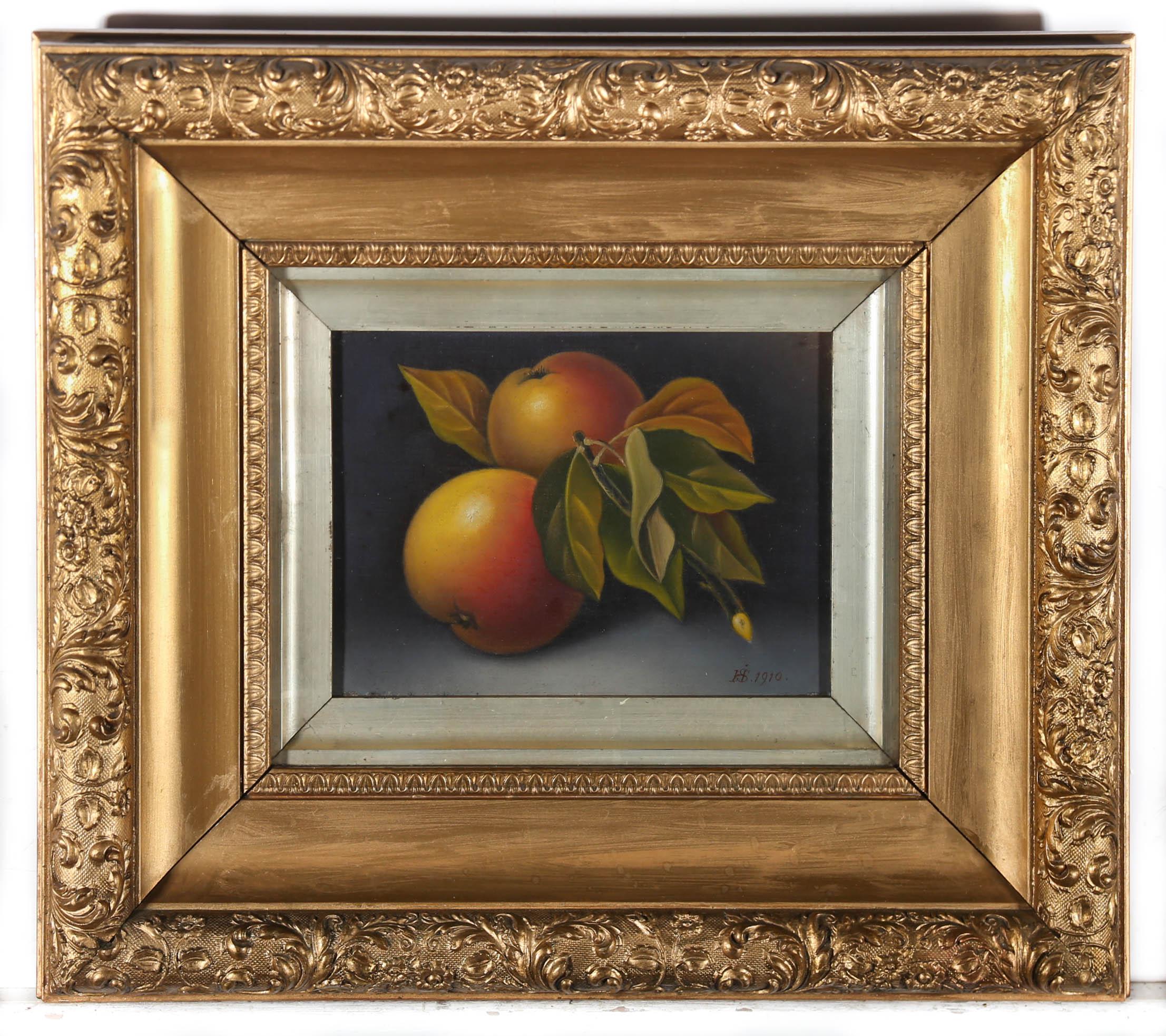 A charming still life study depicting two apples still attached to a sprig of leaves. Signed with monogram to the lower right and dated 1910. Well-presented in an ornate gilt slip and frame with scrolling acanthus and lambs tongue running pattern.