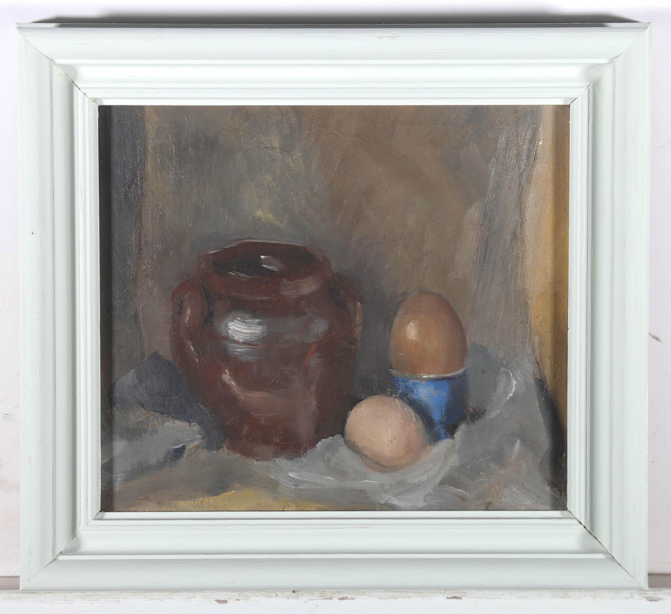 A miniature still life of two eggs framed next to a chocolate brown urn. Unsigned. Presented in a charming white frame. On board.
