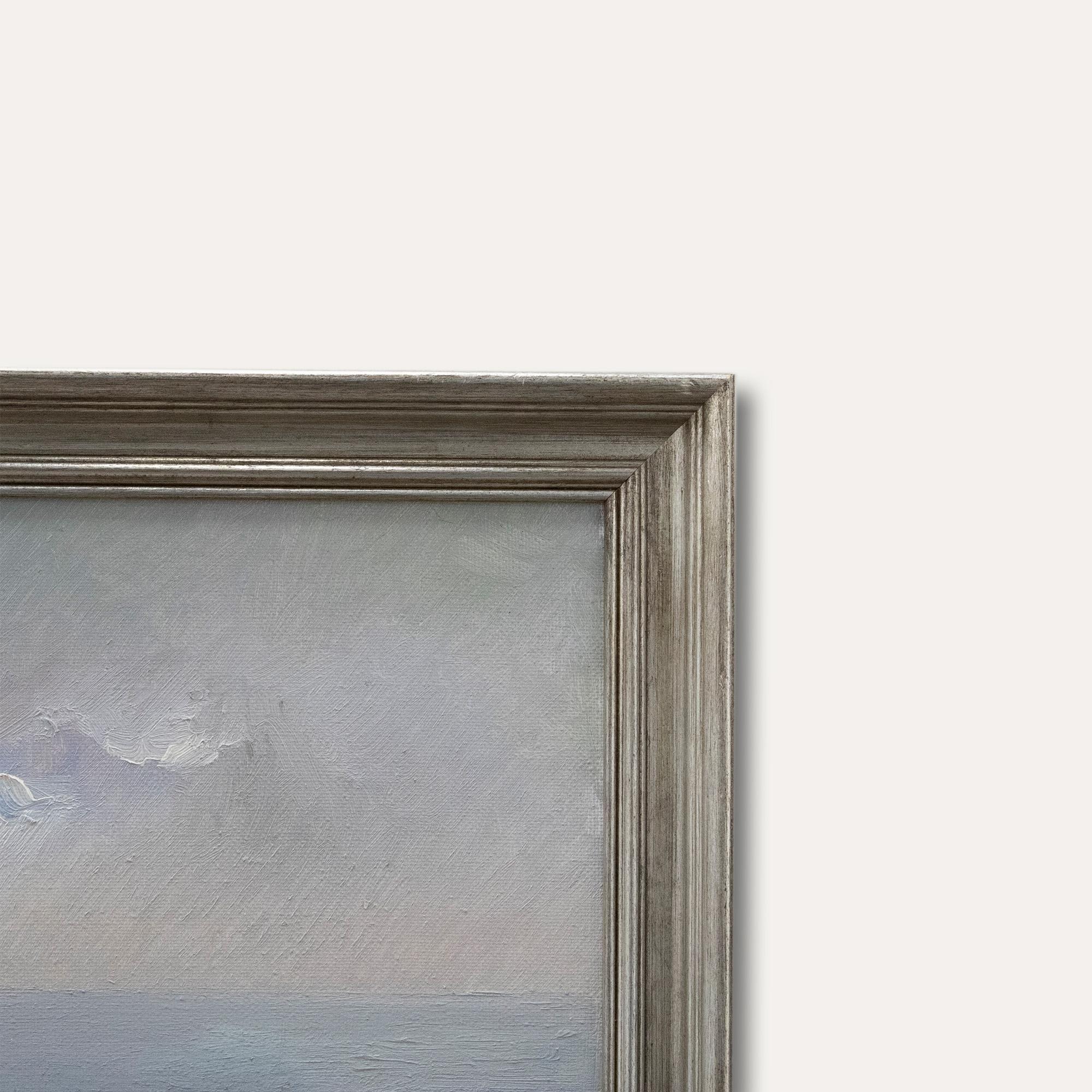 An impressionist depiction of coastal rain falling on the horizon. Well presented in a contemporary silver-effect frame. Indistinctly signed. On canvas on stretchers.