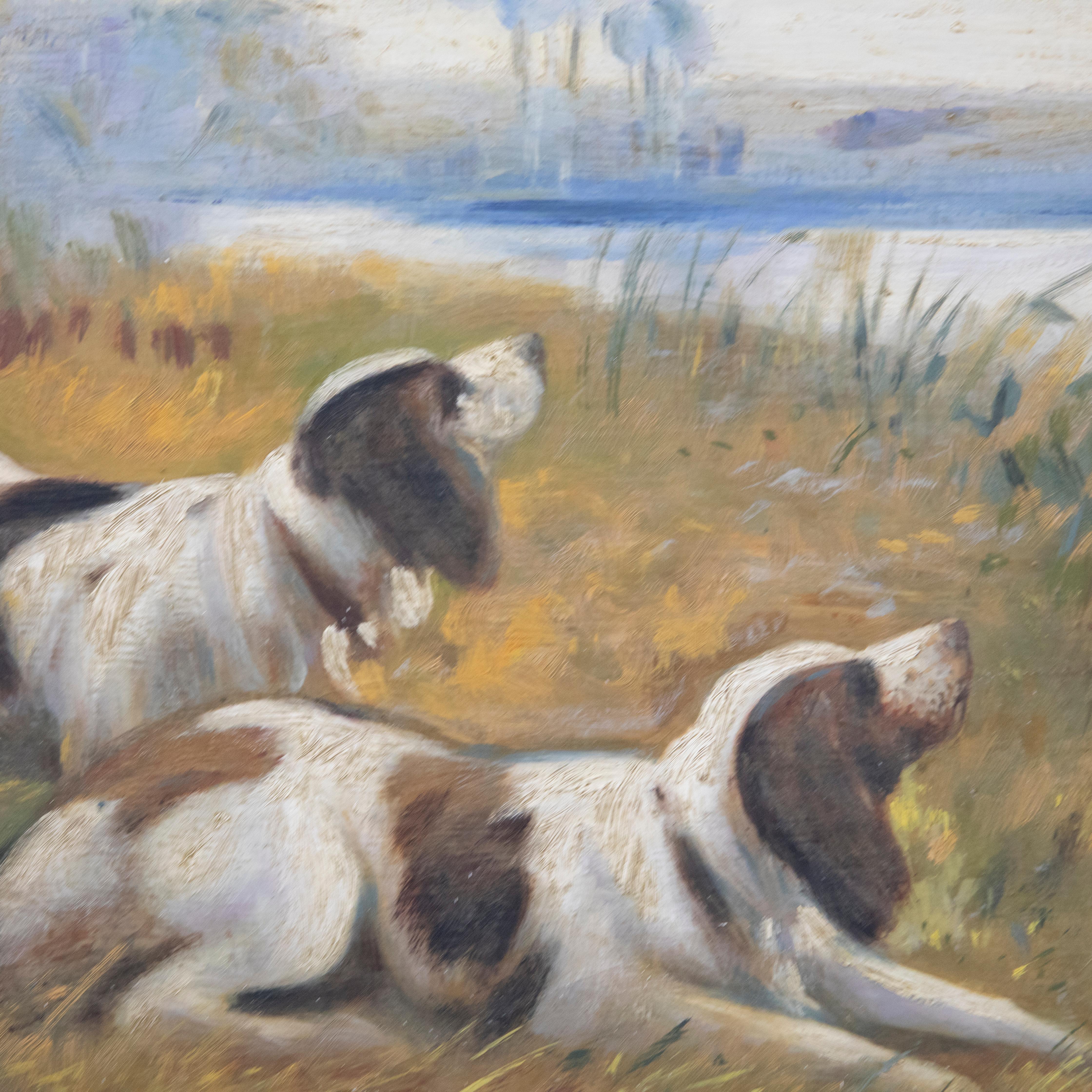 Une étude à l'huile du début du 20e siècle représentant deux épagneuls de travail excités et impatients de se baigner dans la rivière rafraîchissante. L'huile porte le monogramme de l'artiste en bas à gauche. Présenté dans un cadre en bois