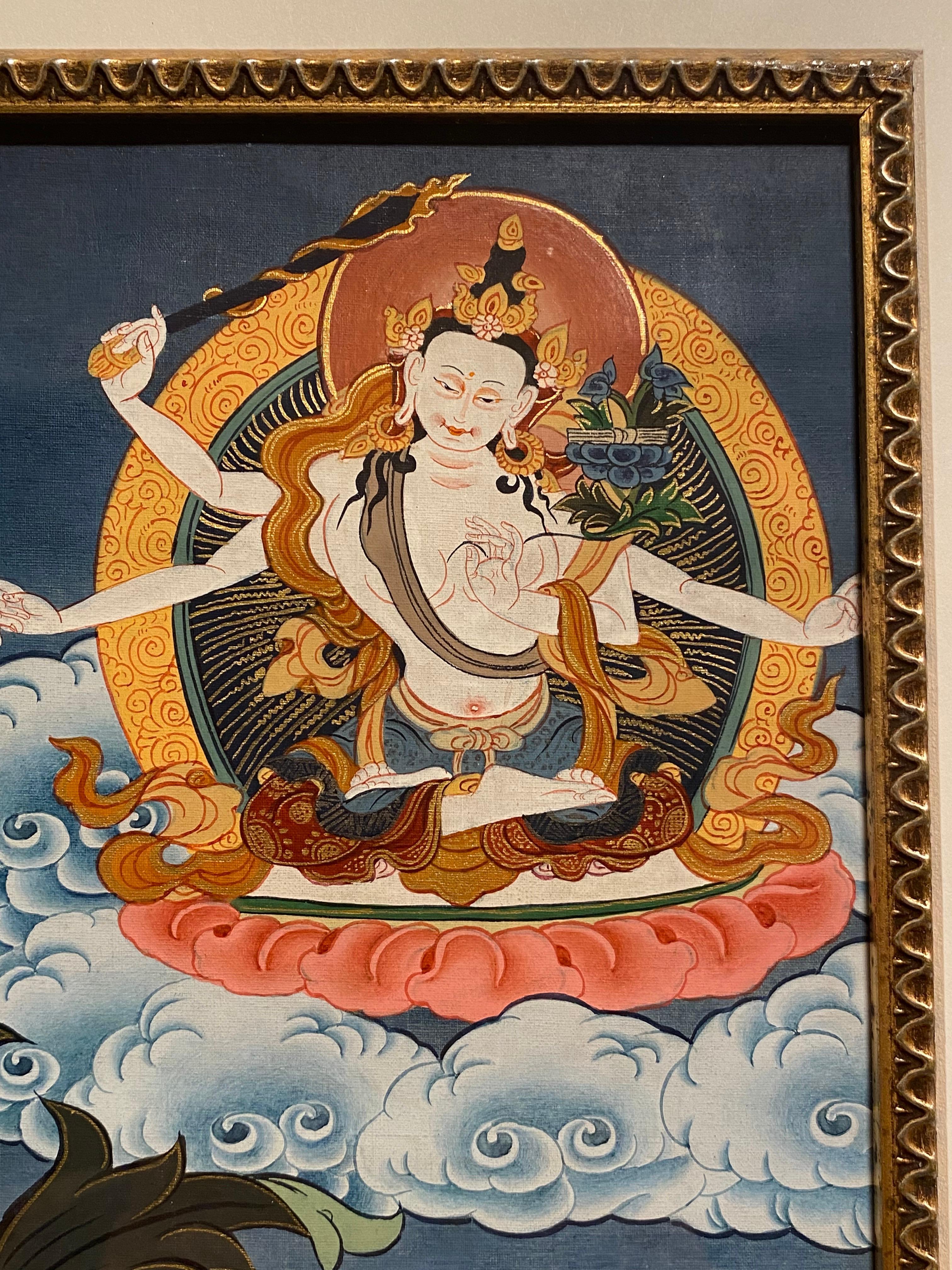 This framed, hand-painted Manjushree thangka on canvas is adorned with 24K real gold. Every detail has been thoughtfully considered in the framing to meet the highest standards.
Dimensions without the frame: 18.5