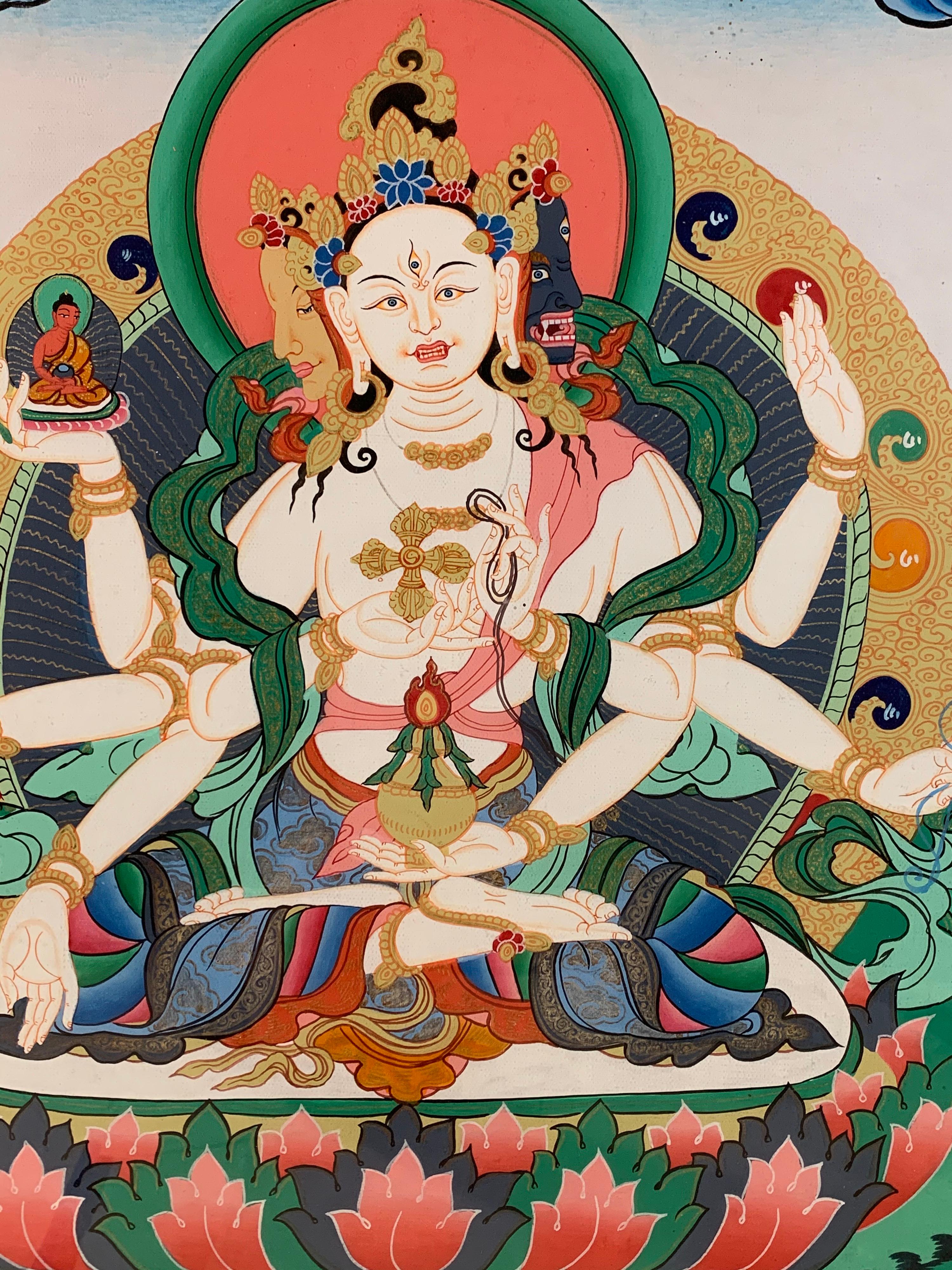 Framed figurative thangka of Vajra-Shakti is hand painted on canvas with 24 carat real gold. Seated in meditation pose on a lotus throne at lush green mountain, he is holding a vajra in one hand. Vajra shakti is mainly associated with tantric use