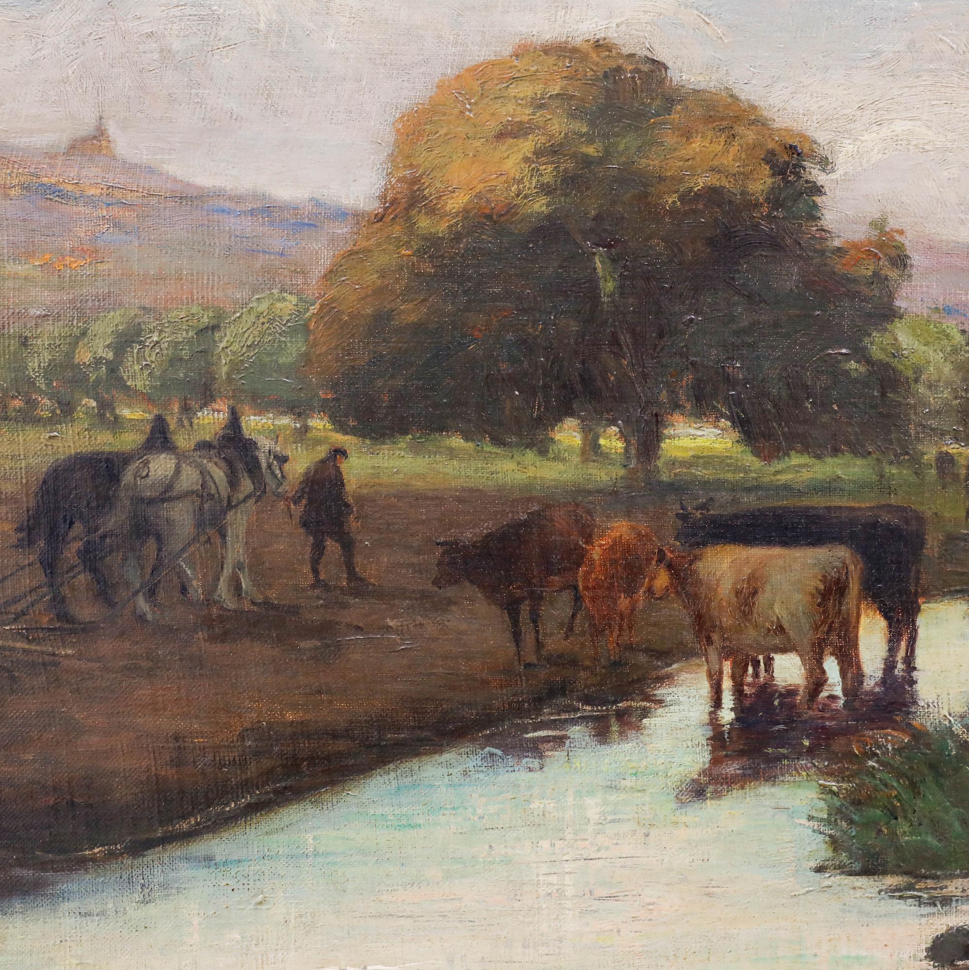 This large impressionist painting captures a serene evening in the countryside with farm buildings in the background. The composition captures the surrounding hills bathed in the soft light of the setting sun, with a small river, several cows and a