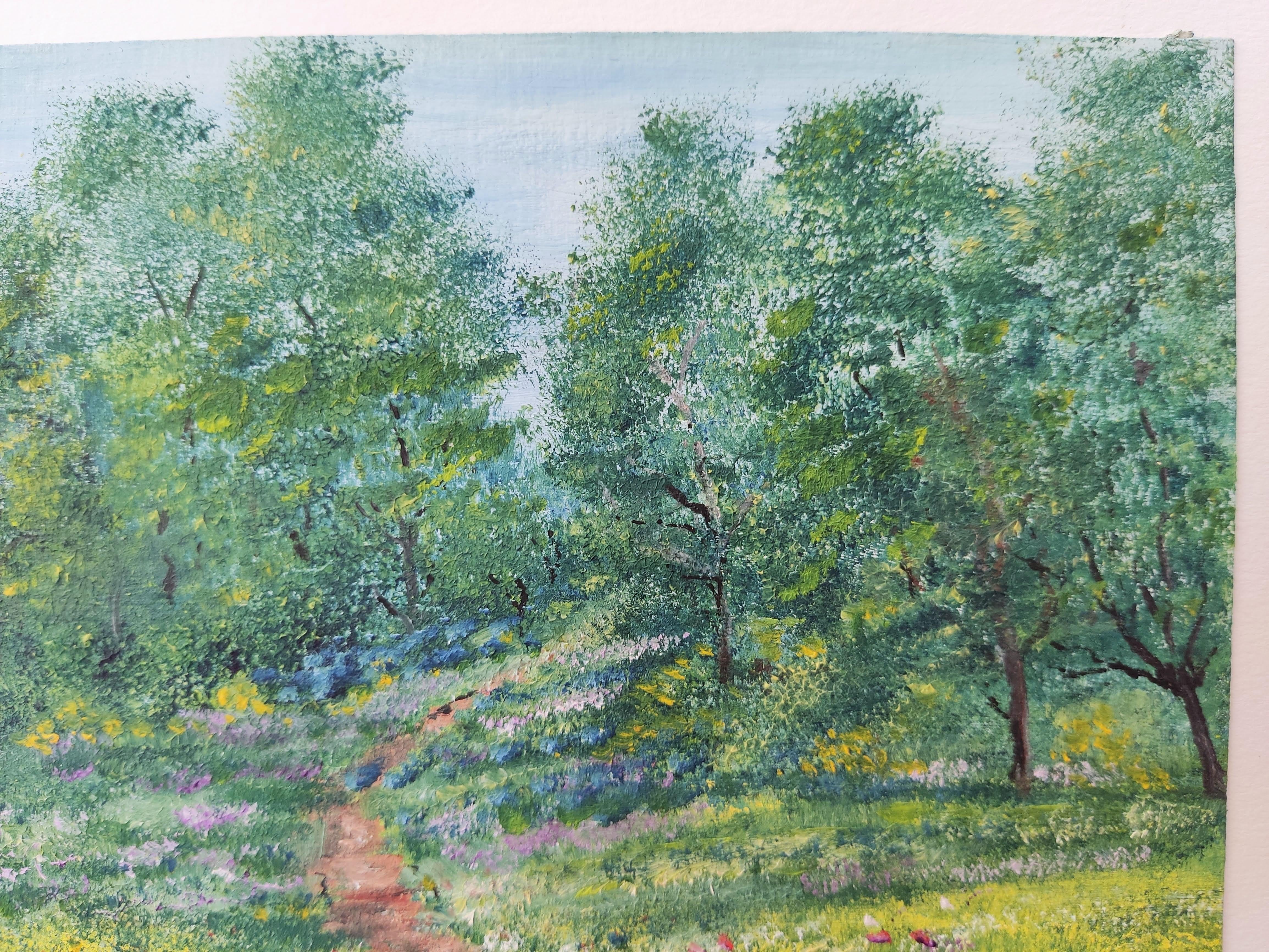 Subject : Small oil painting of a landscape in the French countryside, in excellent condition. 

The work presents a bucolic landscape of striking visual richness. A winding path cuts through a lush meadow, framed by brilliant flowers that evoke