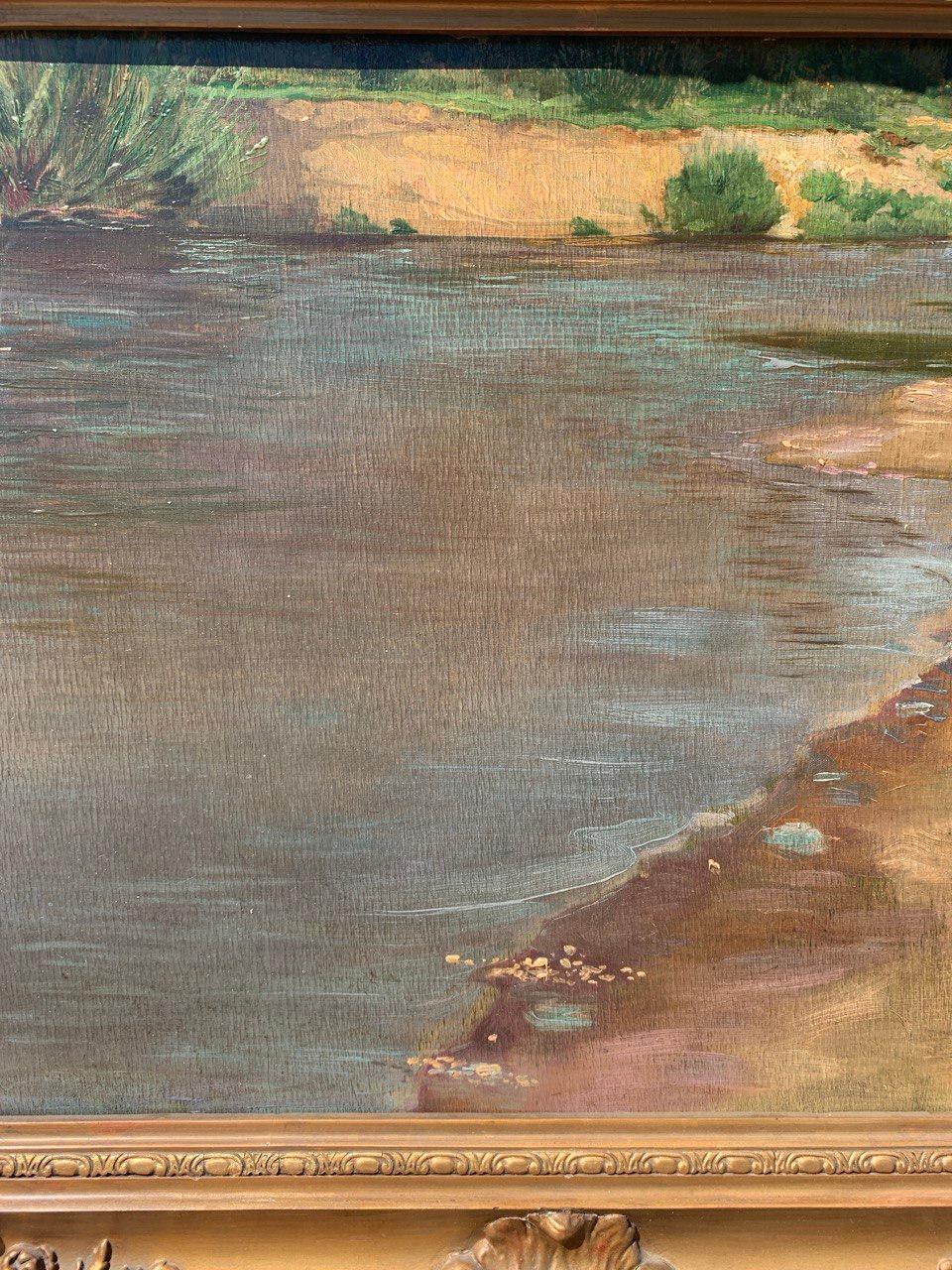 French Impressionist painter (19th century) - Landscape with lake.

50 x 70 cm, without frame, 75 x 95 cm with frame.

Antique oil painting on panel, in a finely carved and gilded wooden frame (not signed).

Condition report: Good state of