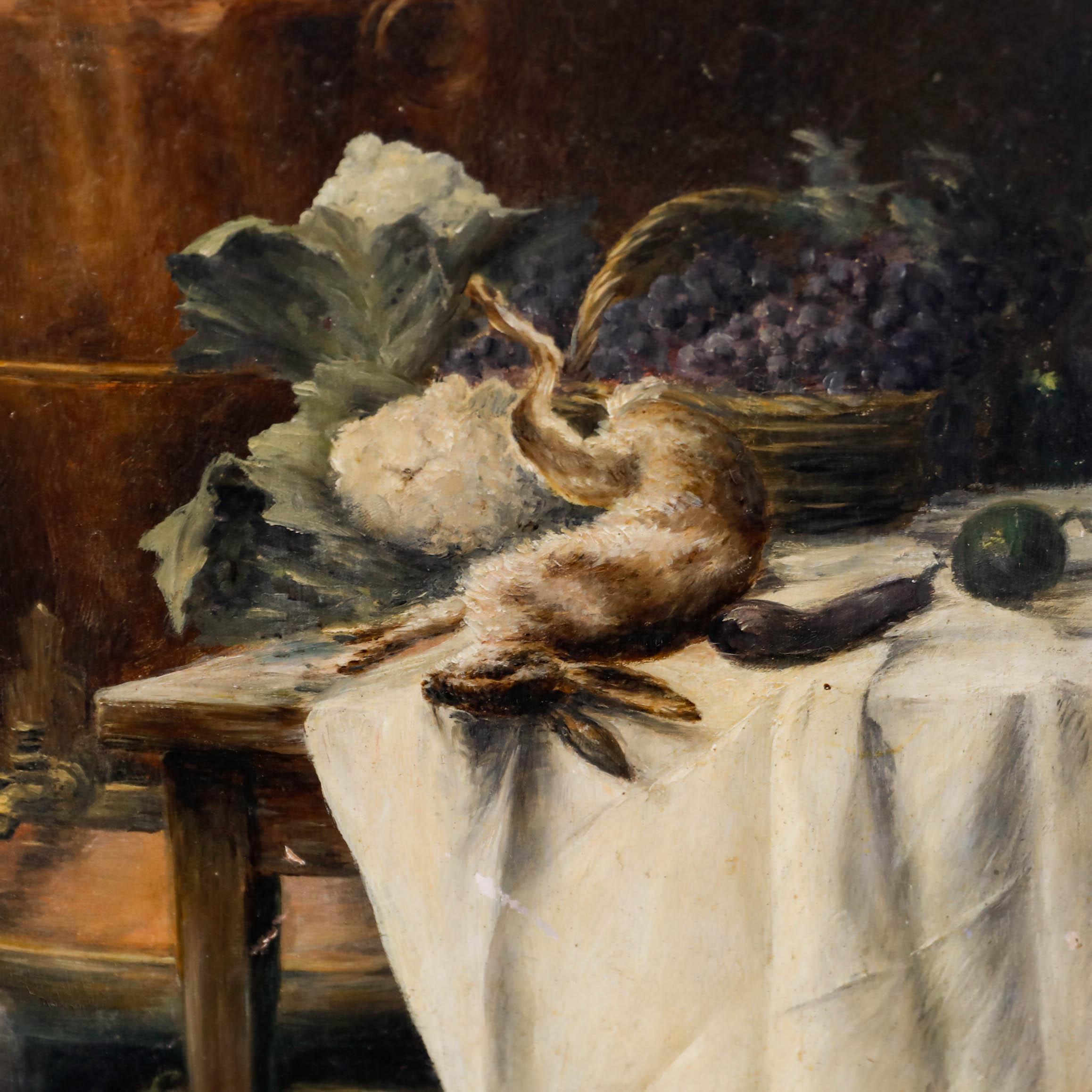 A French kitchen still life with copper and brass hot water tank beside a wooden table, dressed with produce from the garden and a freshly caught hare. Well presented in a rustic wooden frame. Unsigned. On millboard. 