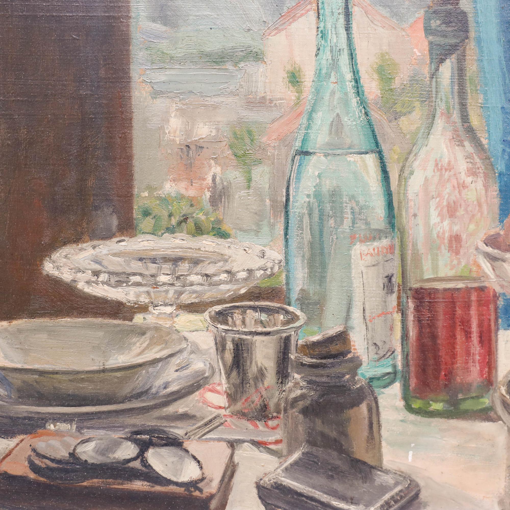 This still life painting features an intimate domestic scene with carefully arranged tableware including plates, glasses and bottles all positioned near a window that reveals a glimpse of the landscape beyond. The composition employs a muted colour
