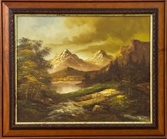 Goldene Berggipfel erheben sich über einem ruhigen Fluss, wo sich Licht und Einsamkeit treffen