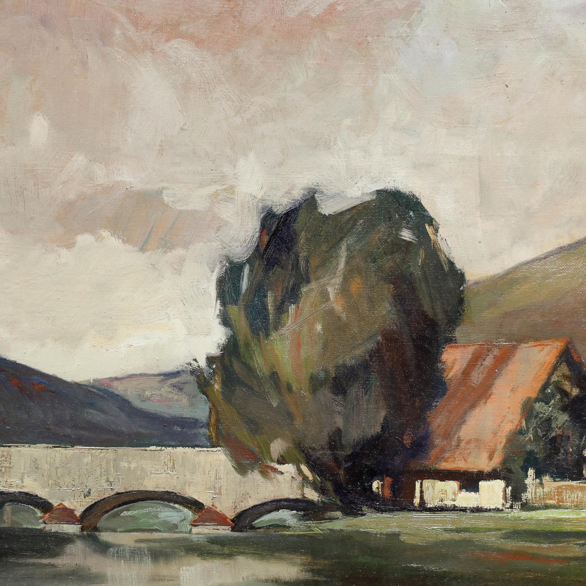 This serene landscape painting by Gustav Adolf Engelhardt (1892-1937) captures a rural landscape with a stone bridge arching over a river, flanked by rolling hills and cottages. The artist's muted palette and soft brushwork create a calming