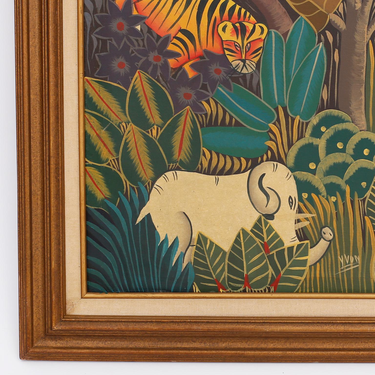Whimsical oil painting on canvas with tigers and elephants in a stylized jungle setting, painted in a folky, naive style typical of Haitian artists. Signed Yvon at the bottom and presented in a wood frame.