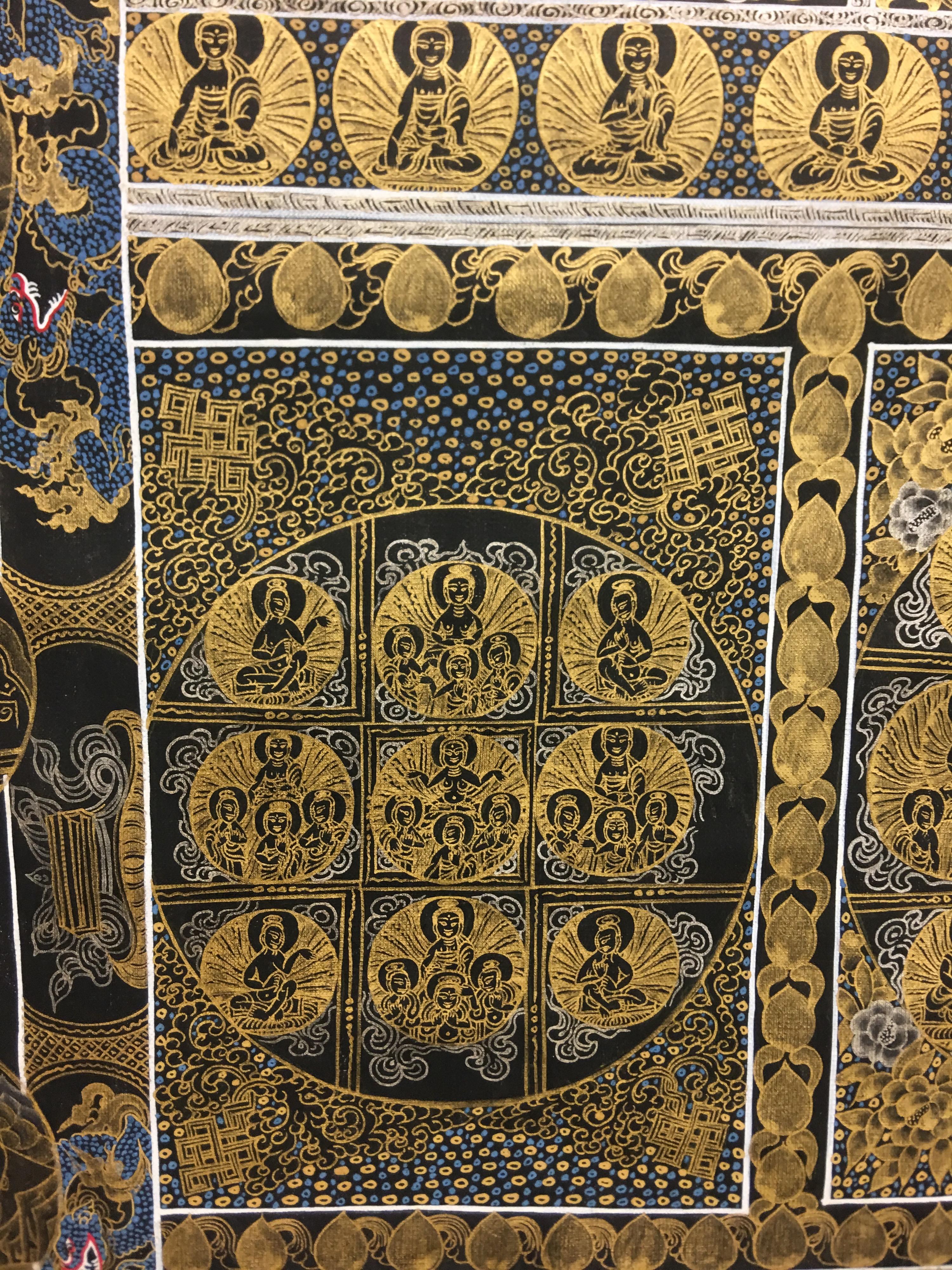 This Buddha thangka is hand painted on canvas with 24k gold. The shimmering of real gold on black background makes it a stunning piece of art . It has nine sections and each section has a set of Buddhas in different poses. A very detail and finest