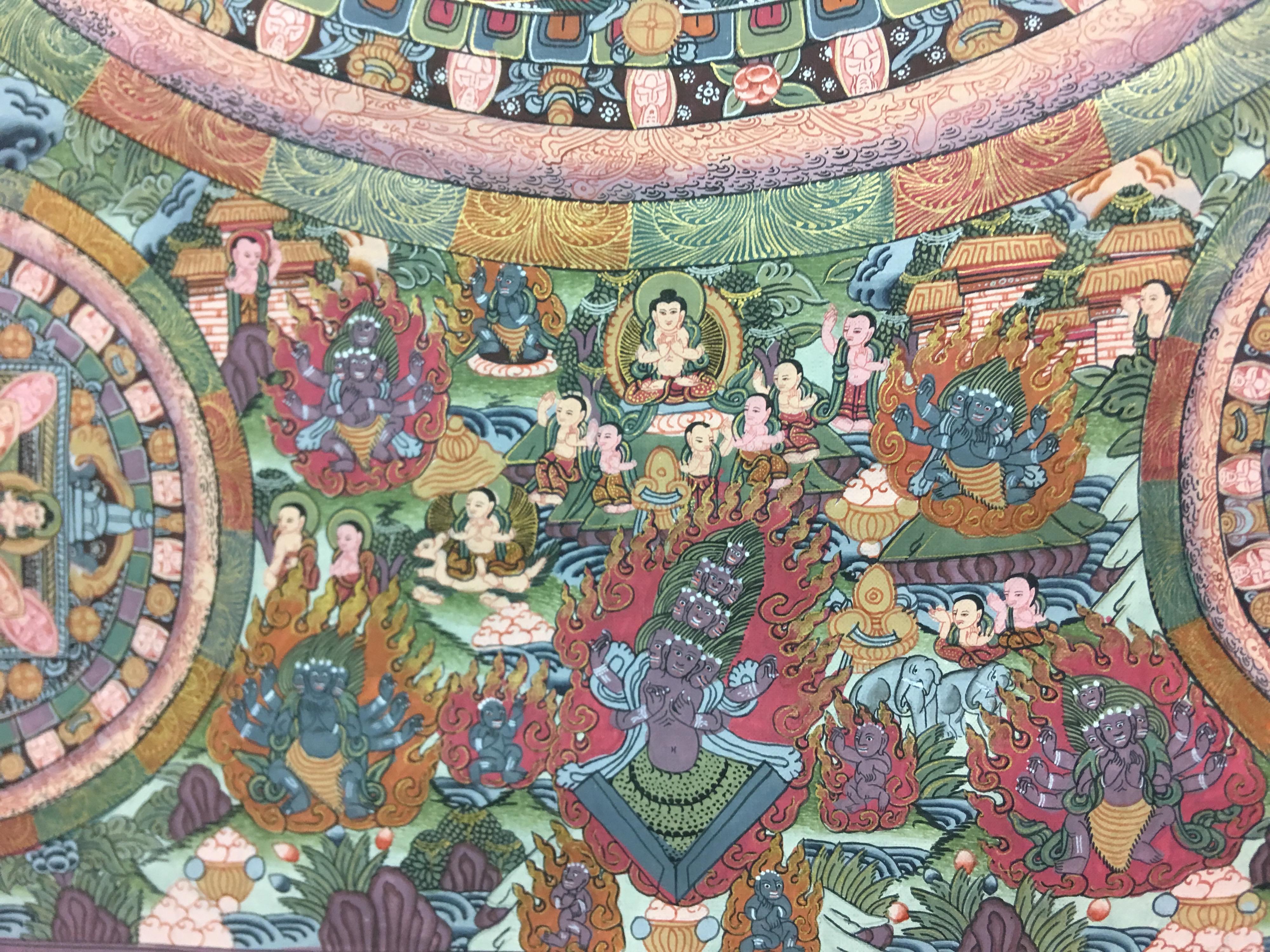This mandala thangka is hand painted on canvas with 24k gold. Different hues of gray,green and peach colors blend seamlessly with the shimmering of real gold. 
Mandala means circle in Sanskrit. Mandala is a spiritual and ritual symbol in Hinduism