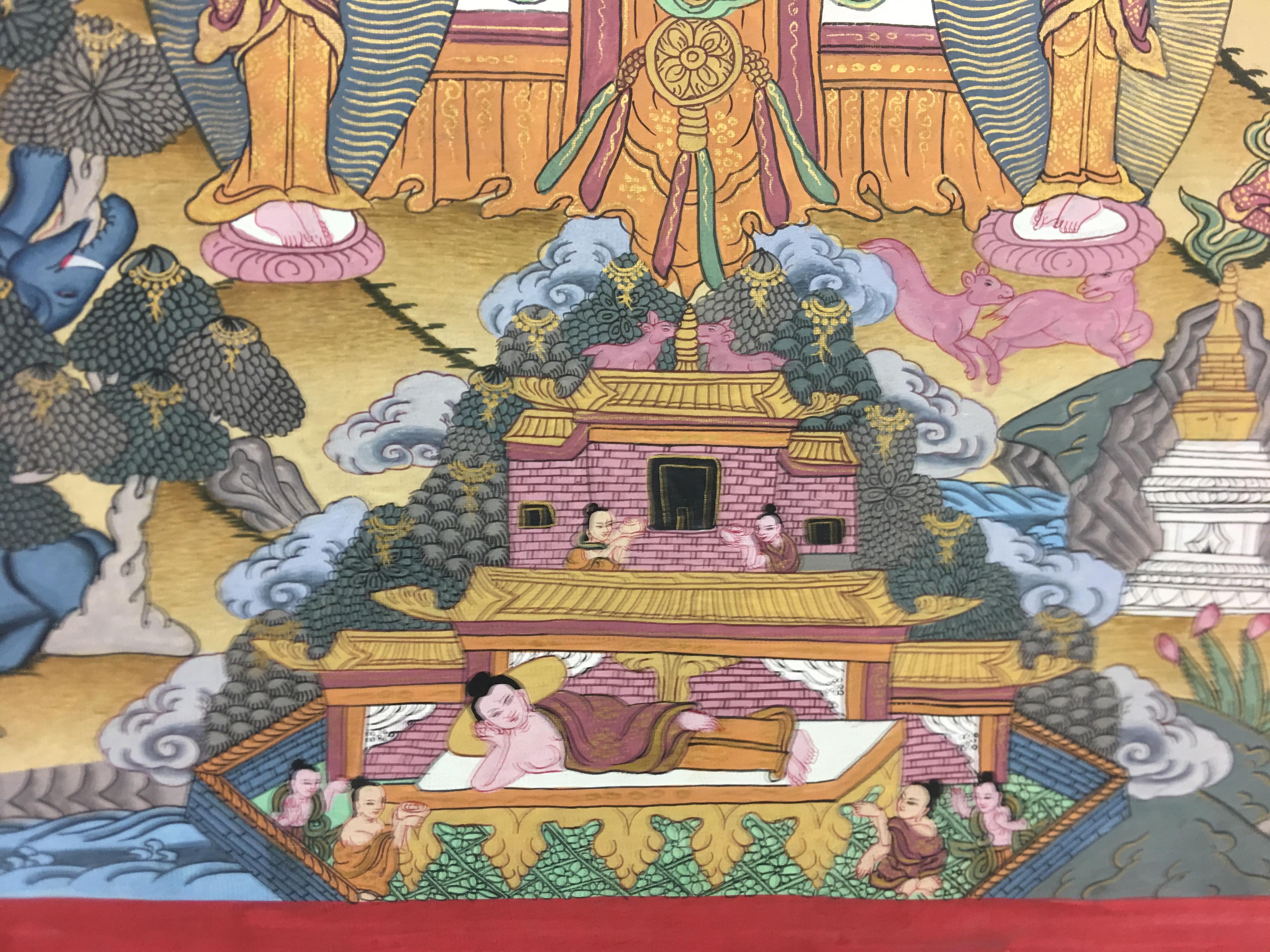 Thangka peinte à la main avec de l'or véritable 24K par un artiste hautement qualifié. Cette peinture élaborée montre les différentes étapes de la vie du Bouddha. L'image centrale représente le Bouddha en train de méditer et les images environnantes